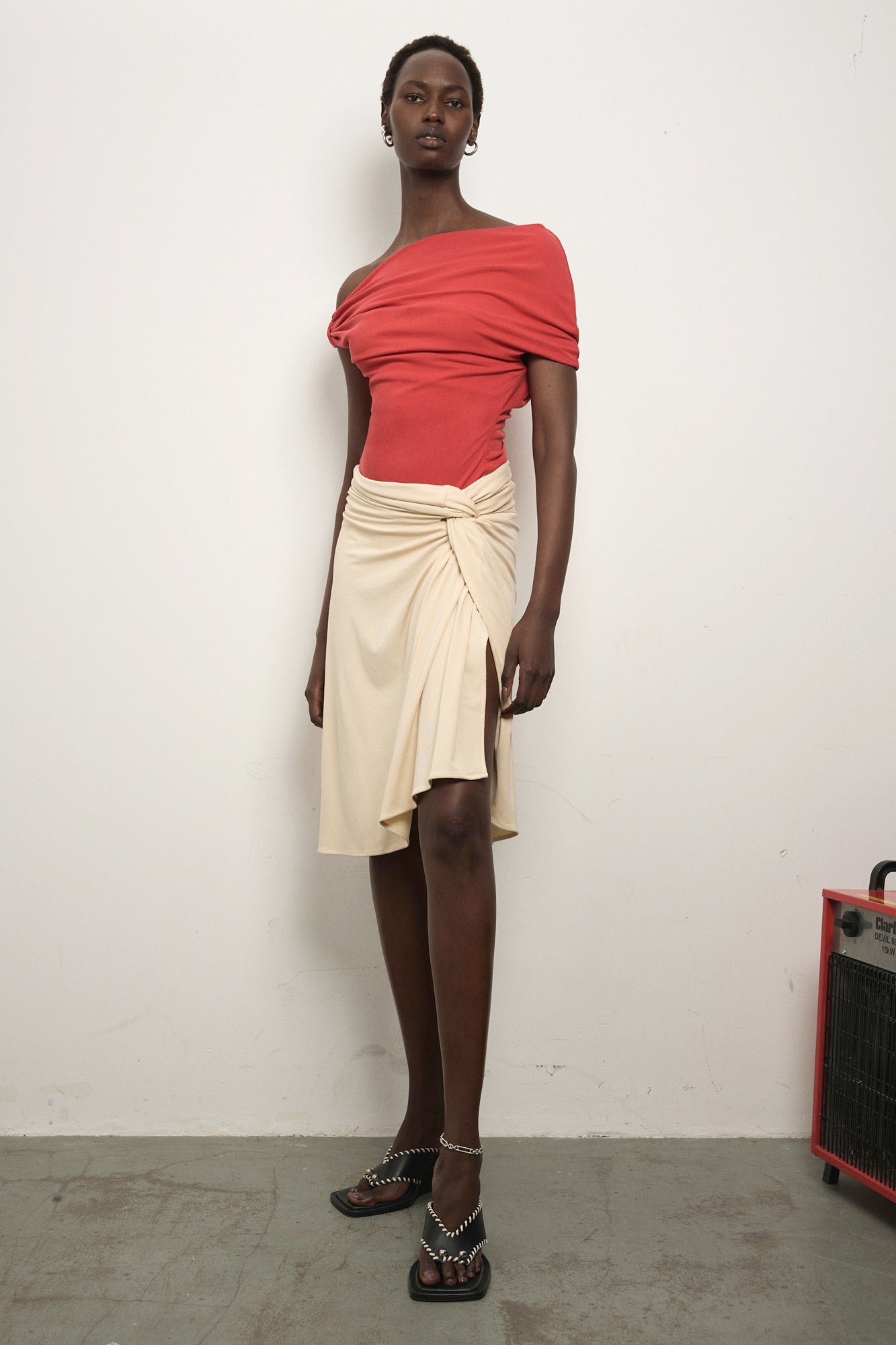 Model wearing Paris Georgia Ida Top in red