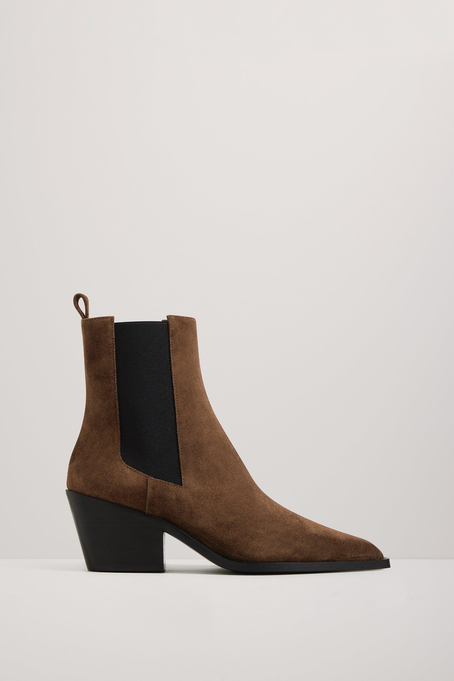 Brown ankle boot with black heel on a white background