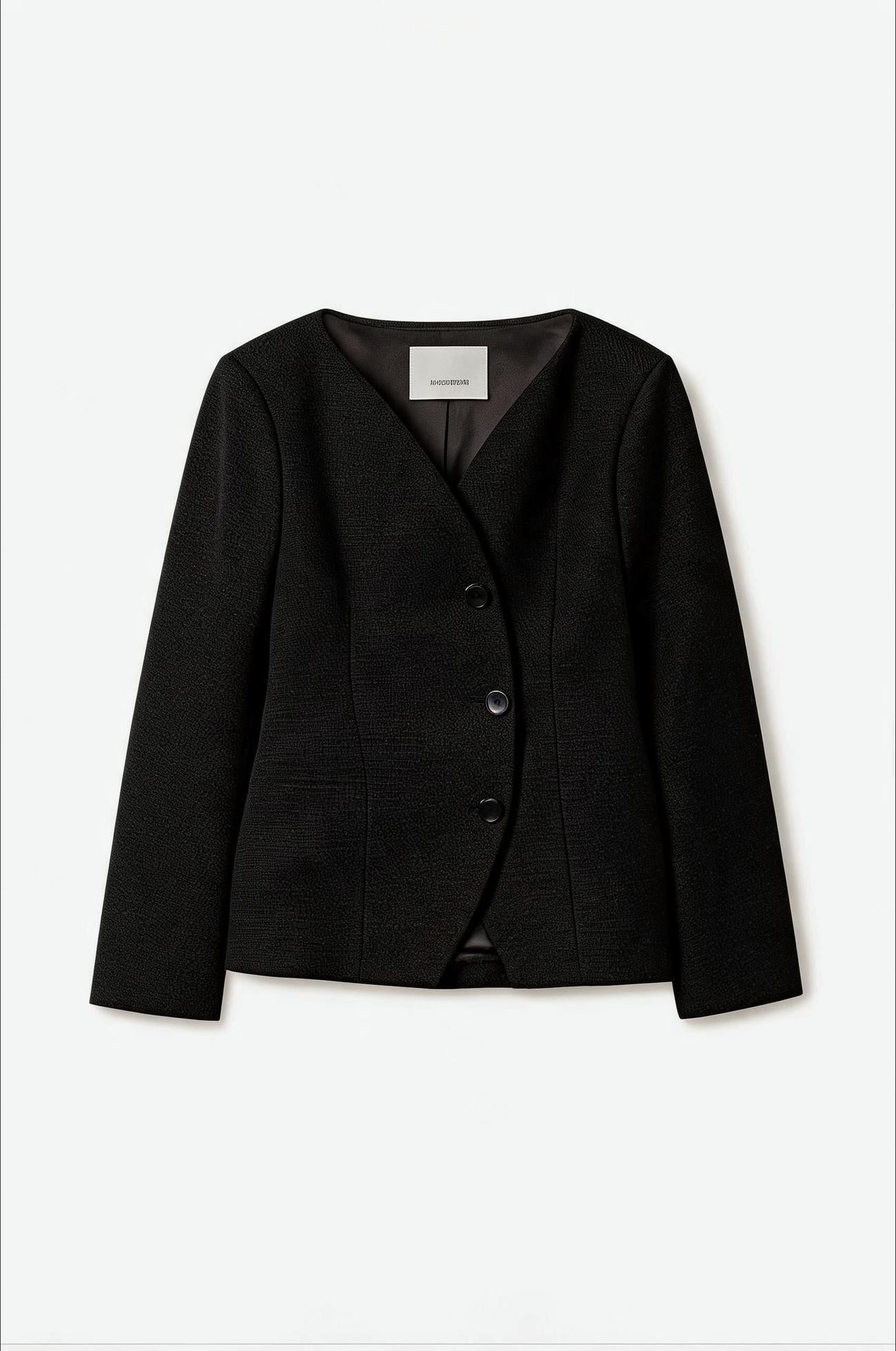 A black textured wrap-style blazer with three front buttons, displayed flat against a clean white background.
