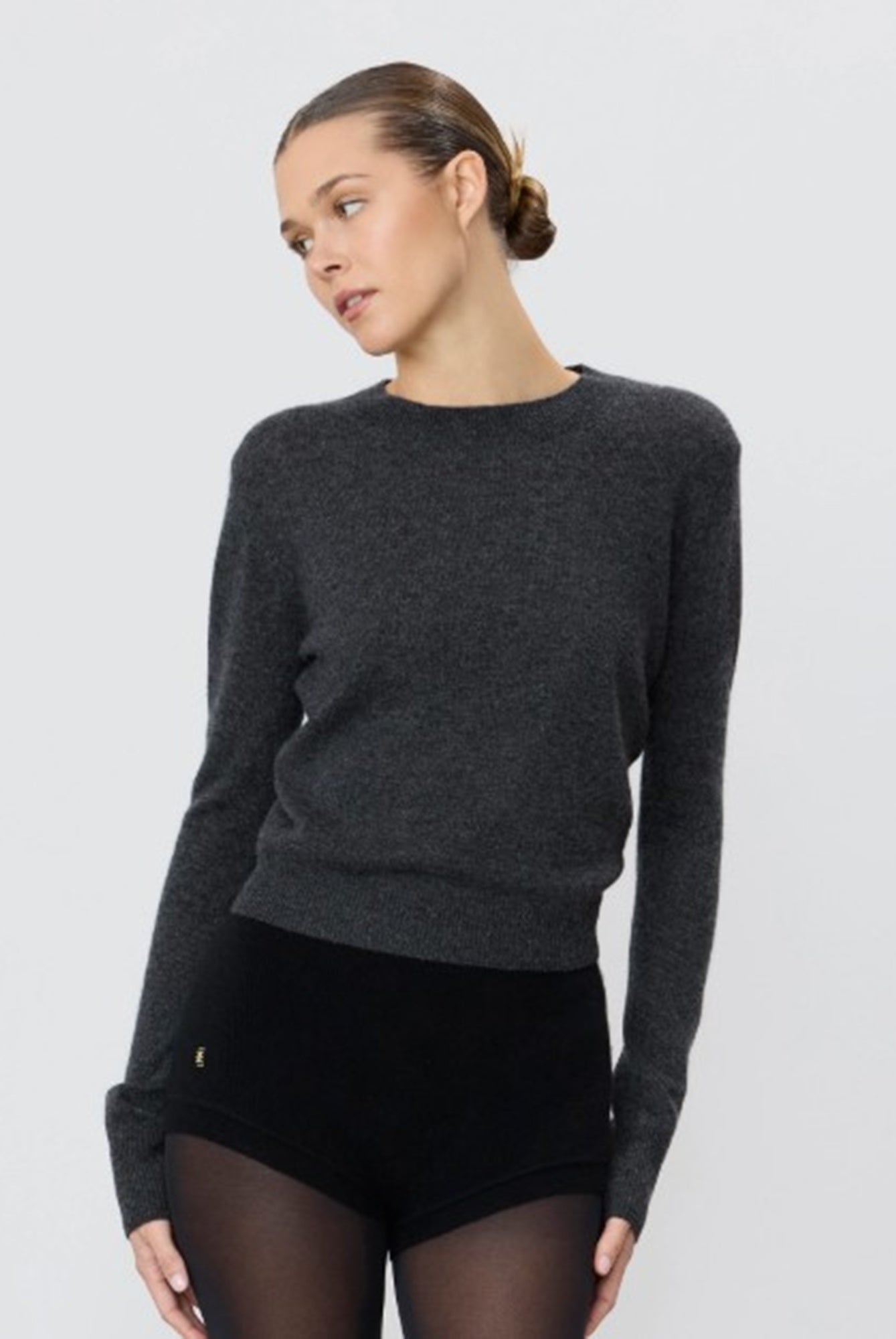 model wearing the Eterne francis sweater in charcoal
