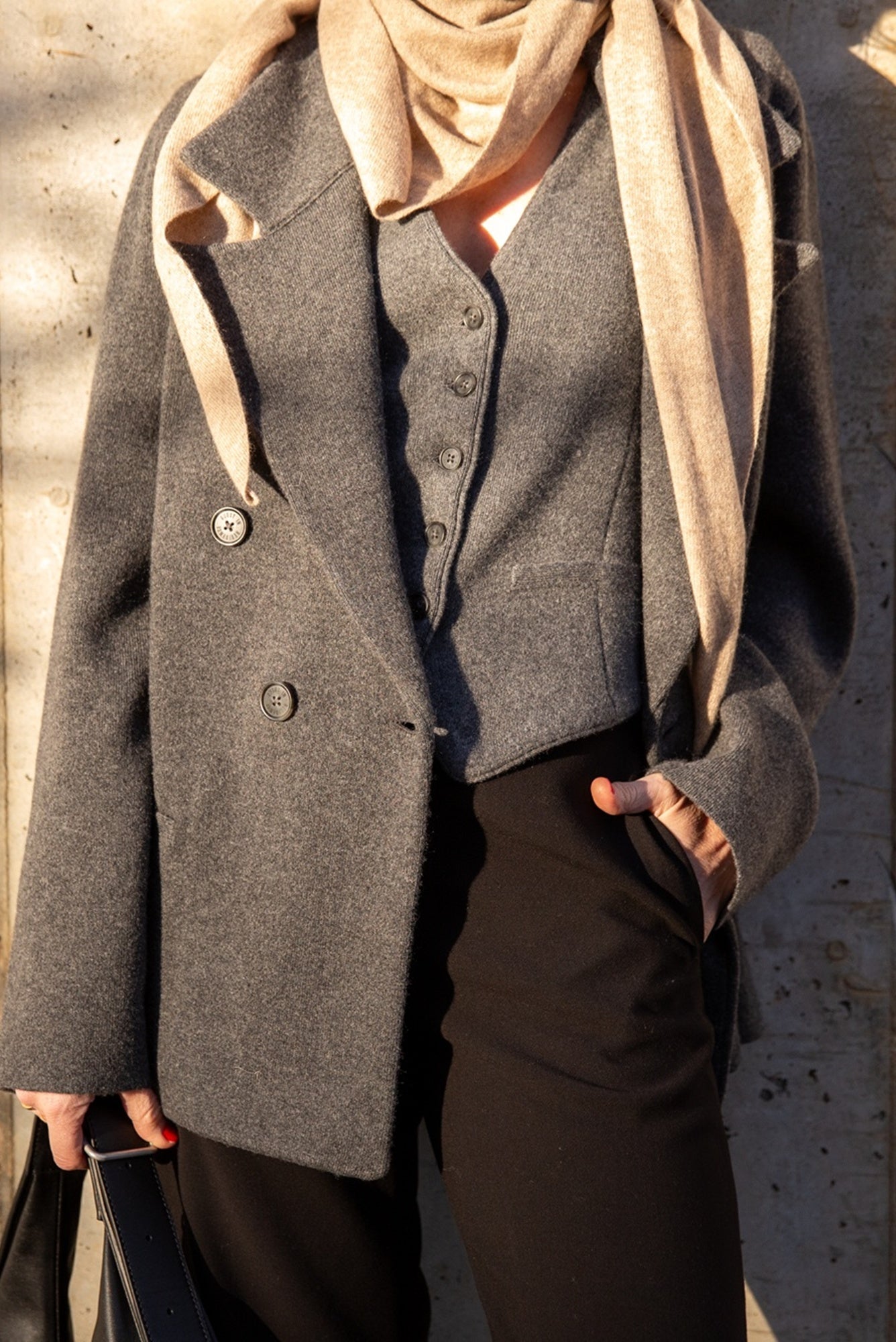 image of a woman wearing the Guest in Residence Tailored Jacket and Vest with scarf