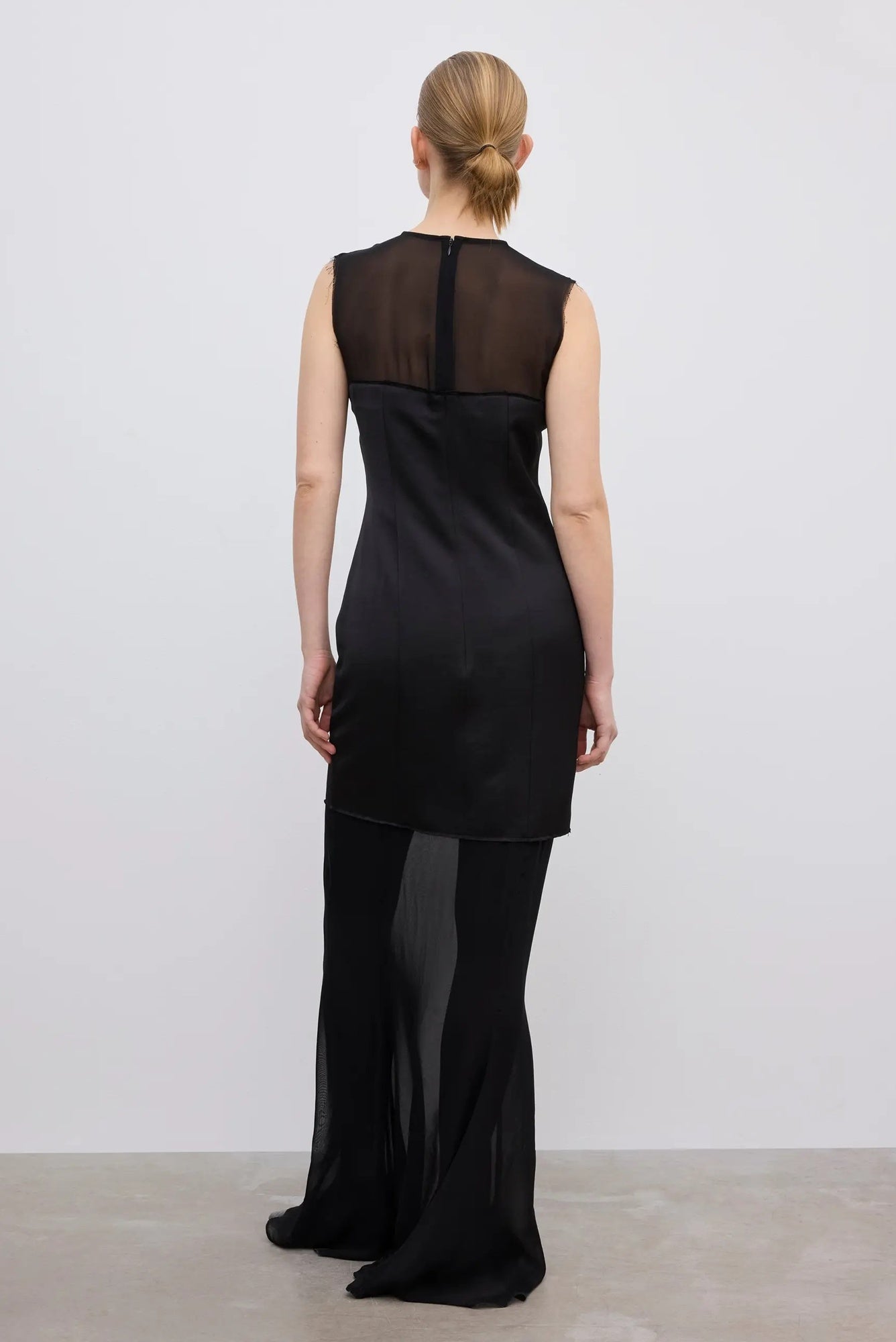 back image of a model wearing the House of Dagmar Two Layer Dress