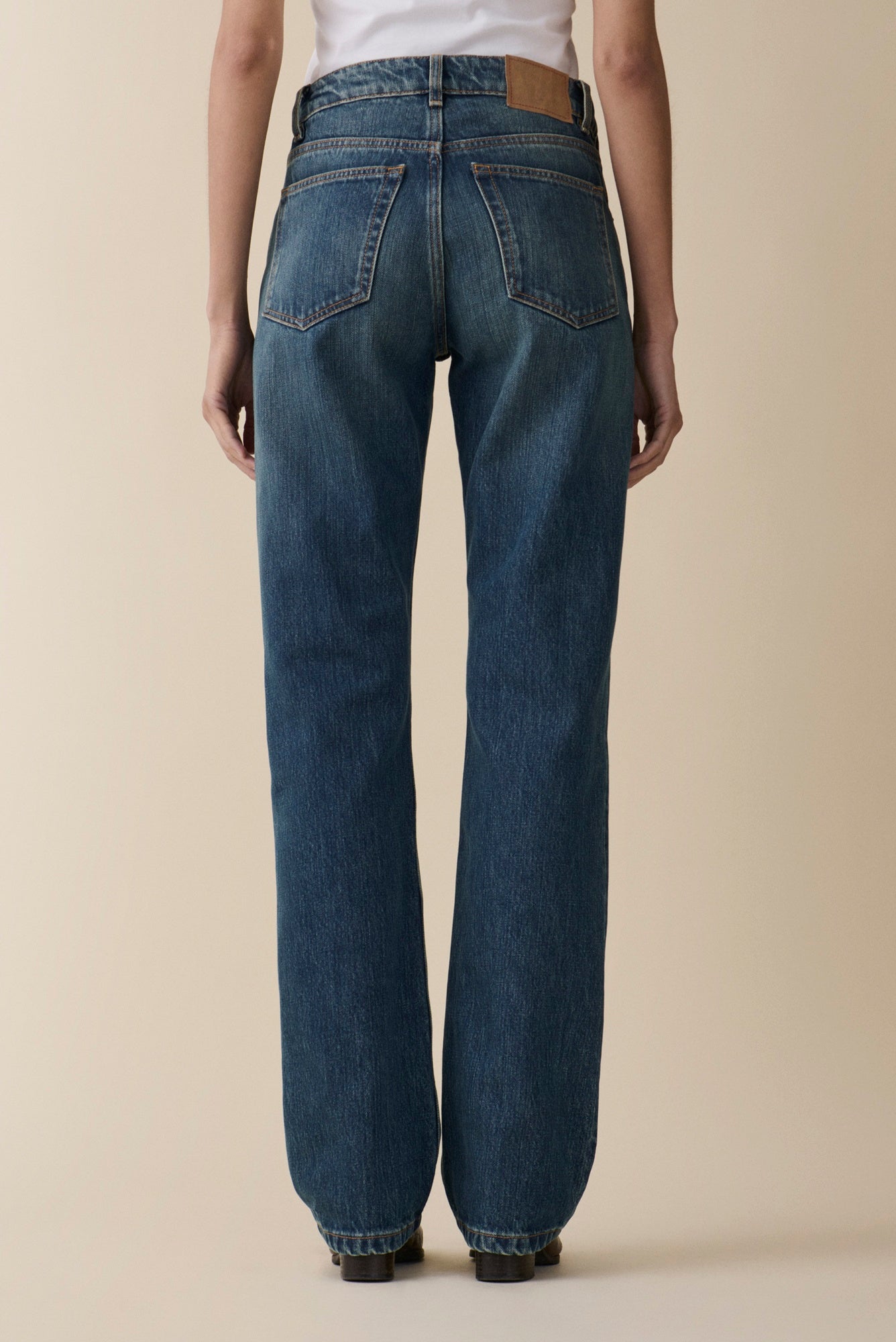 back image of a model wearing the Jeanerica Sisli Jeans in Tinta Verde