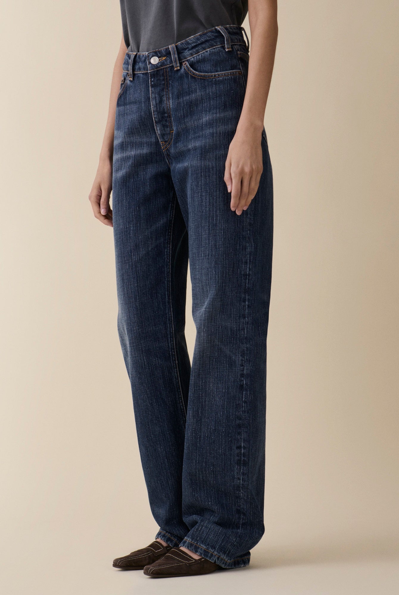 image of a woman wearing the Jeanerica Virgo Jeans in Dark Blue Righe