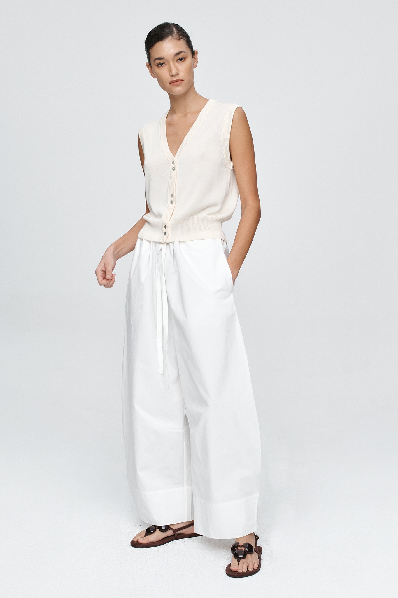 image of a woman wearing the Marle Foundations Vest in Ivory