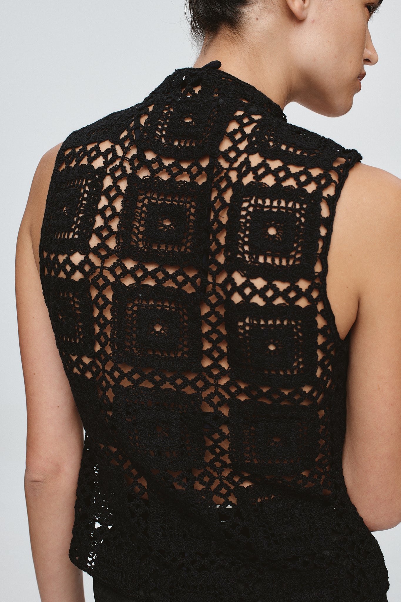 back image of a model wearing the Marle Shri Top