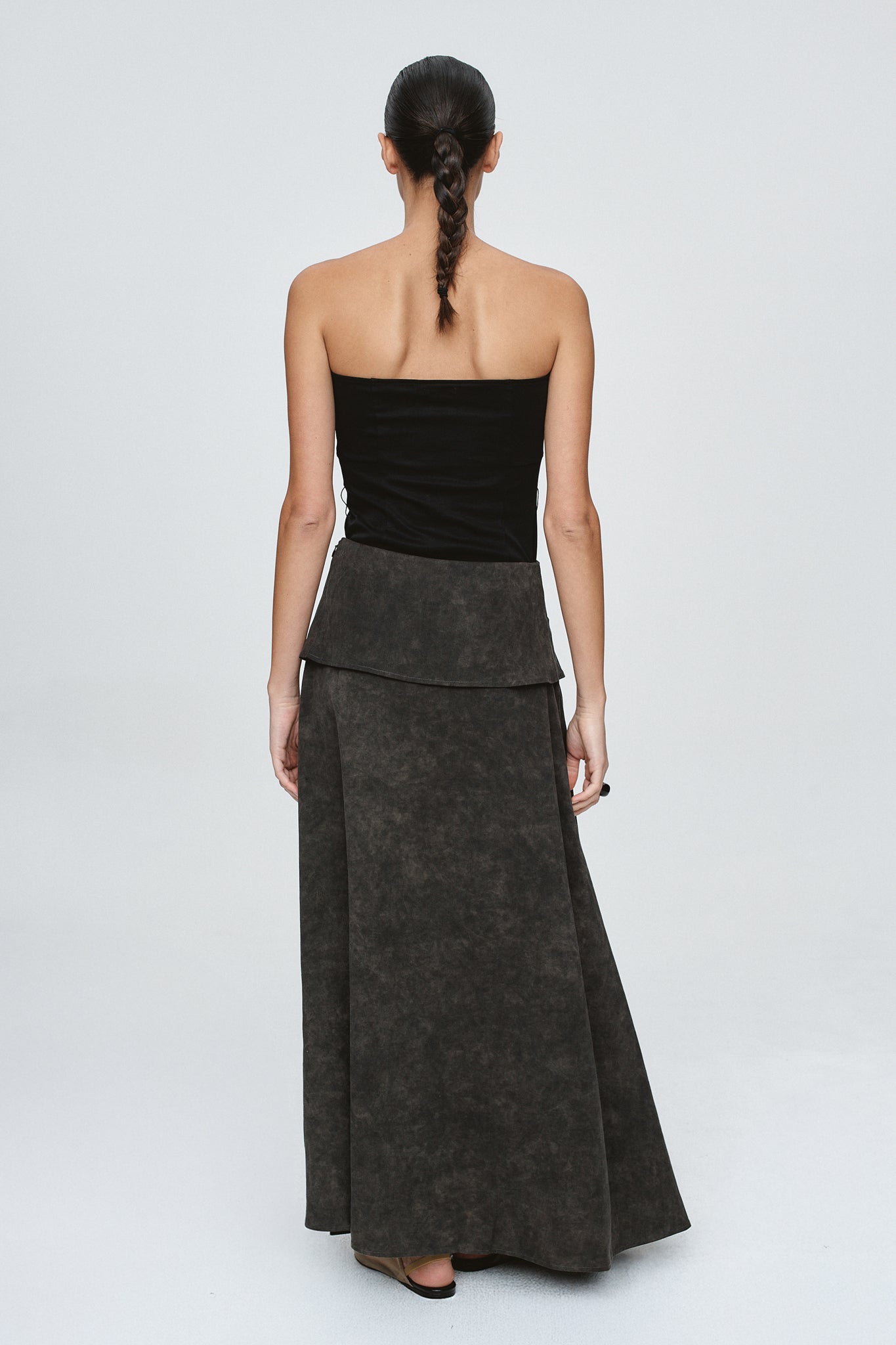 back image of a woman wearing the Marle Taffy Skirt