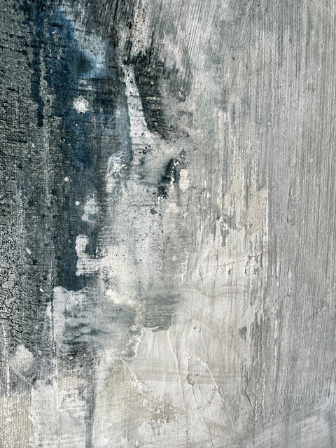 Textured gray surface with abstract patterns