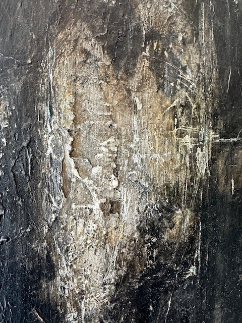 Close-up of a textured surface with dark and light brown tones