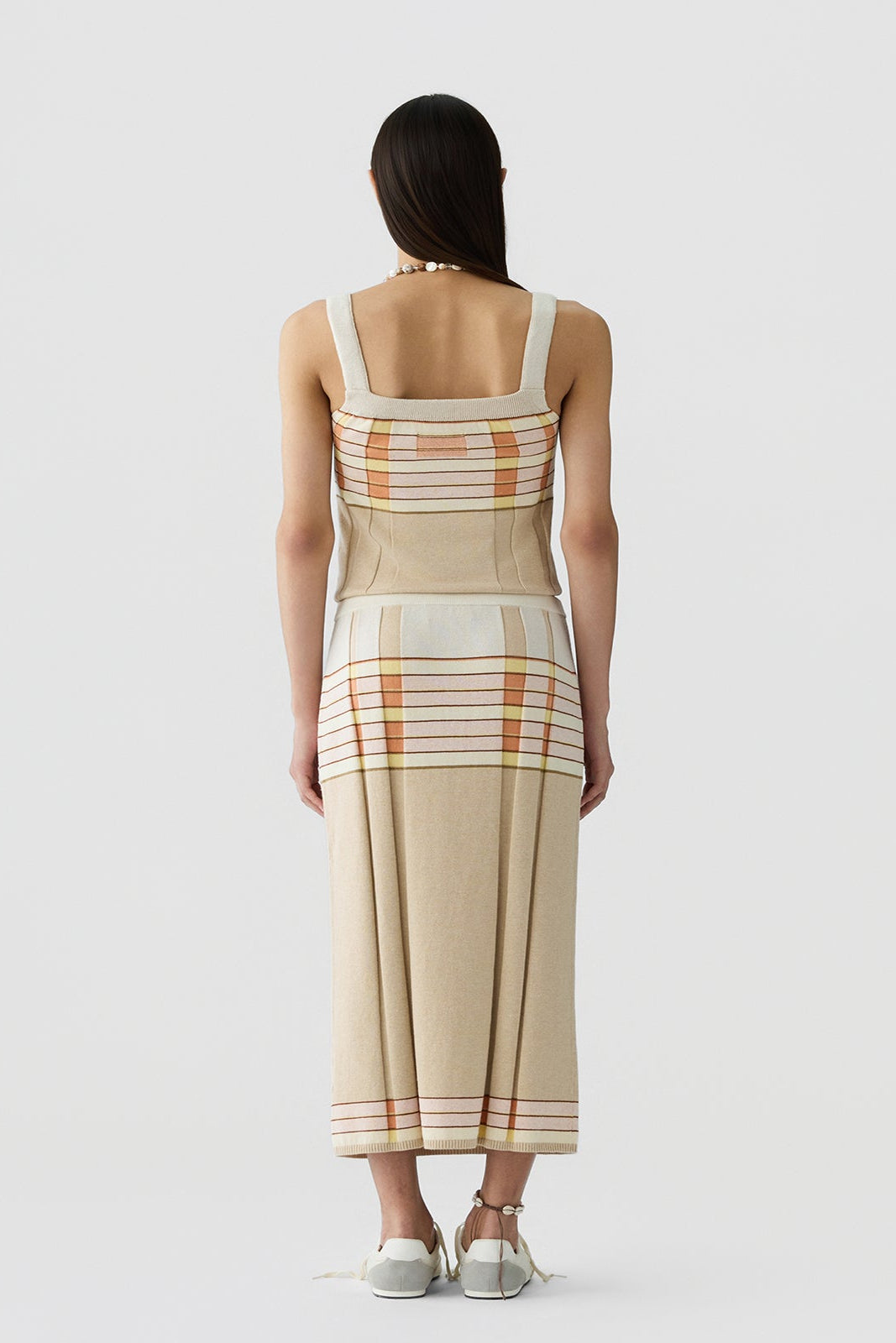 image of a model wearing the Guest in Residence Plaited Rib Skirt