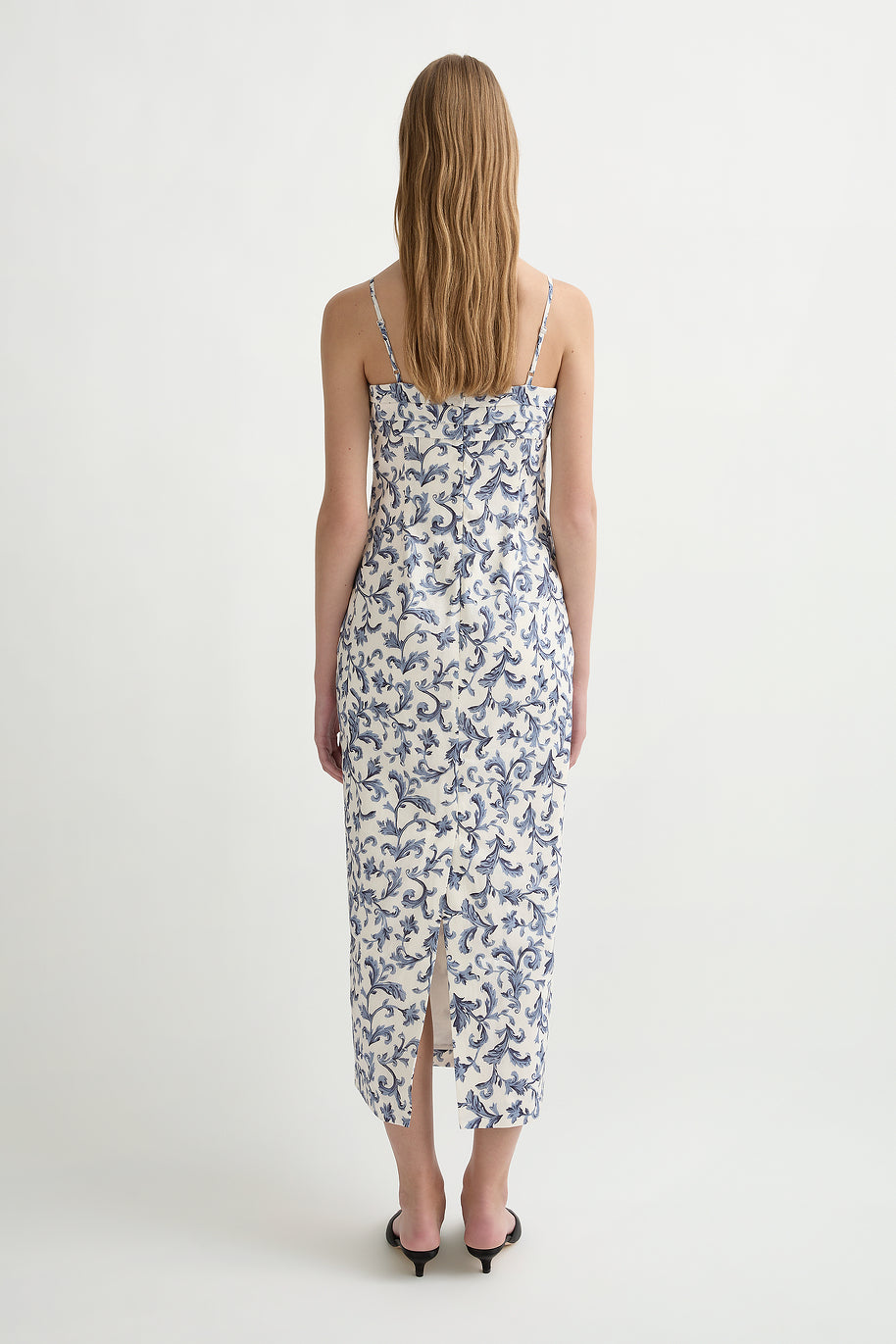 image of a woman wearing the Posse Rue Dress