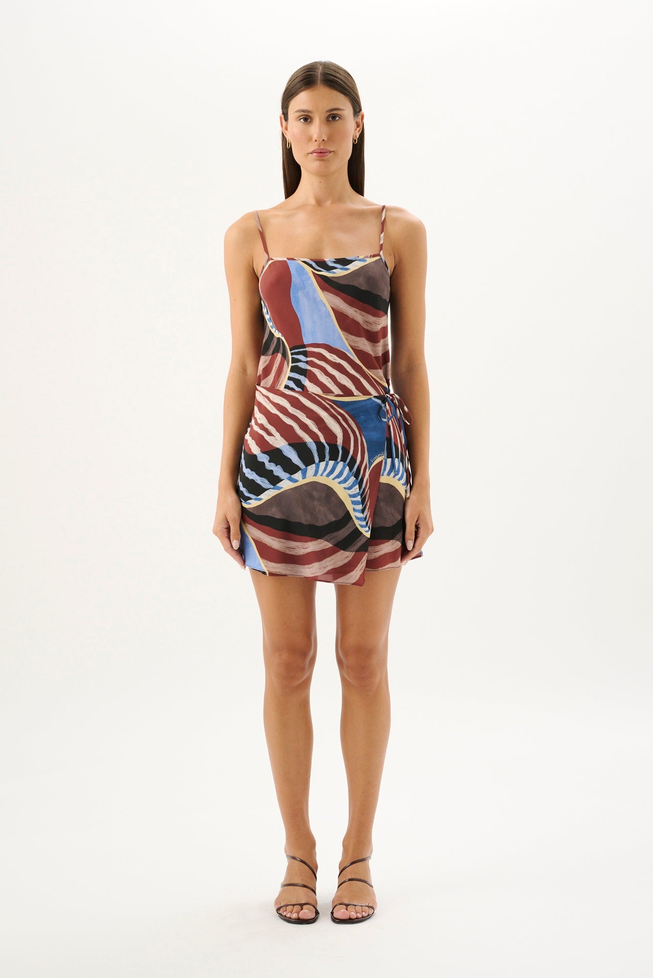 image of a woman wearing the Roame Elsa Mini Dress