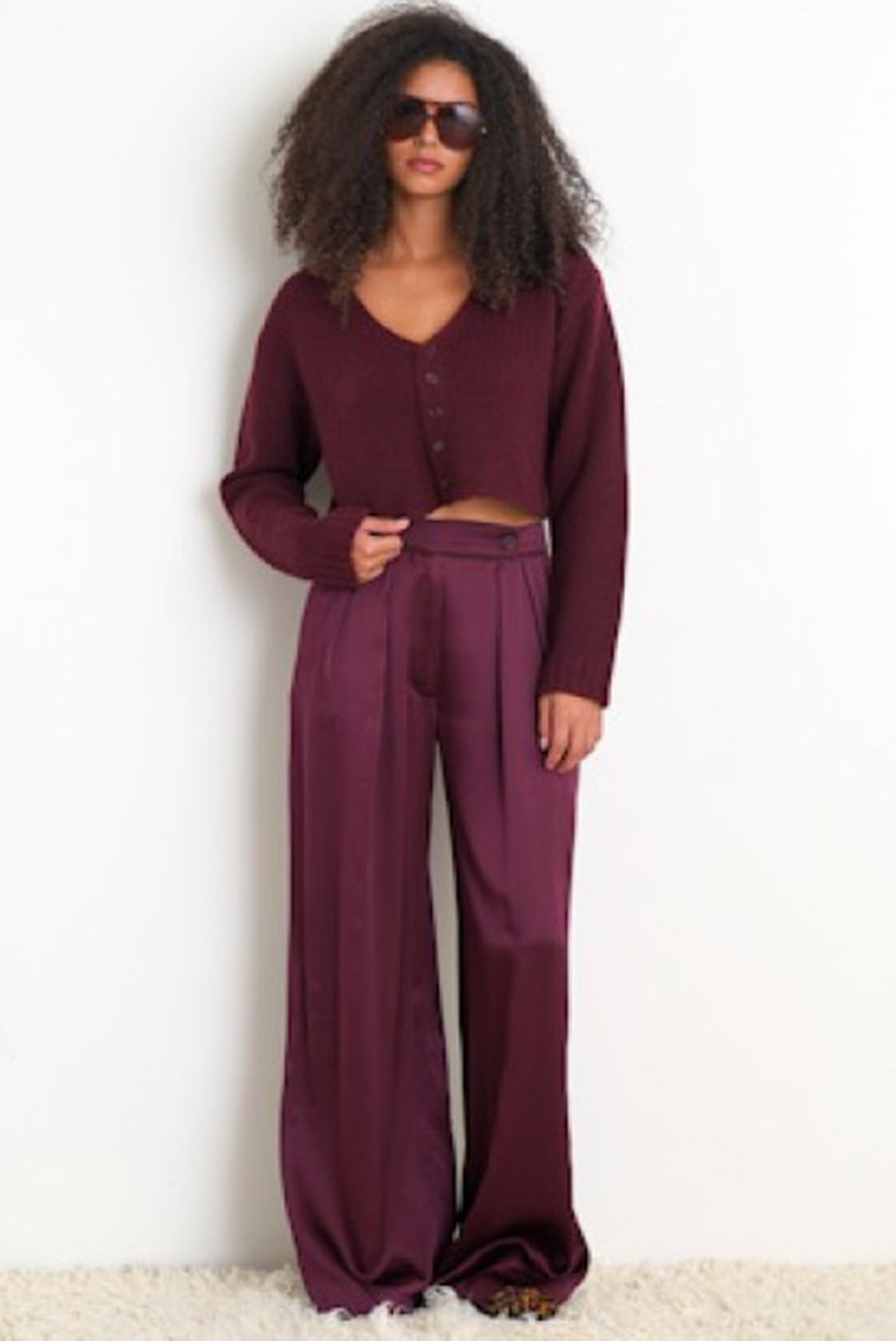 image of a model wearing the Sablyn Bianco Cardigan in Bordeaux