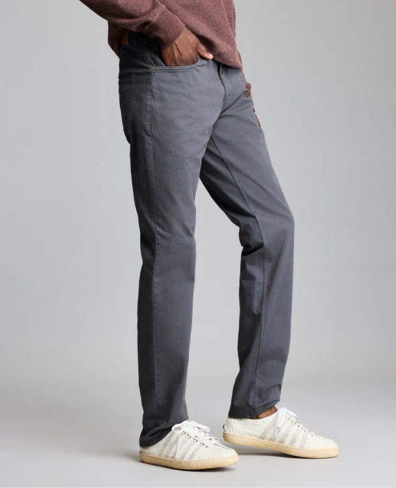 Man wearing the Billy Reid Cochran Jean in Asphalt standing against a white background
