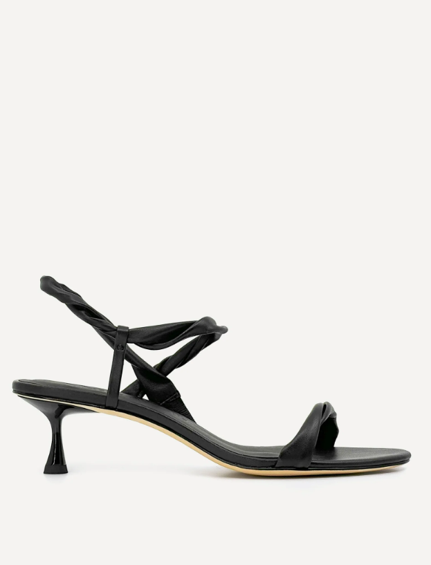 Black sandal with thin straps on a white background