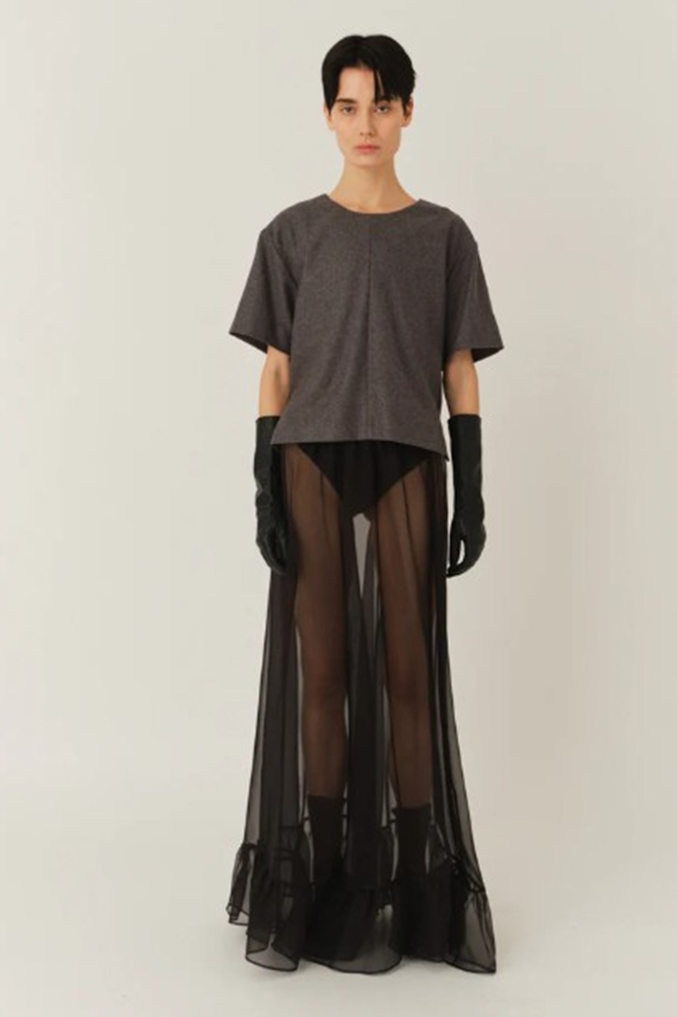 A model wearing the Garment Mitch Top