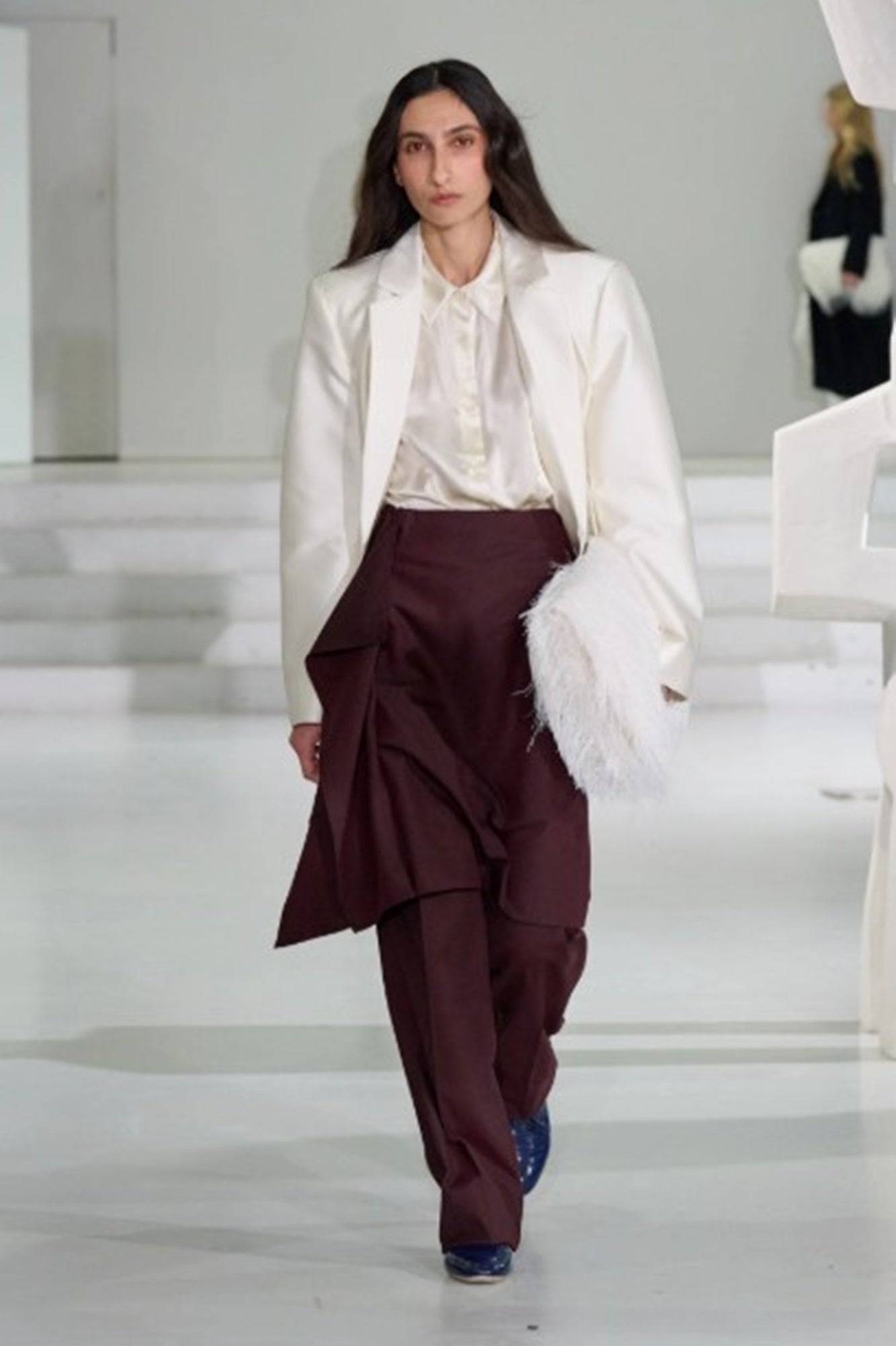 a model wearing the Garment Necchi pants on the AW25 runway