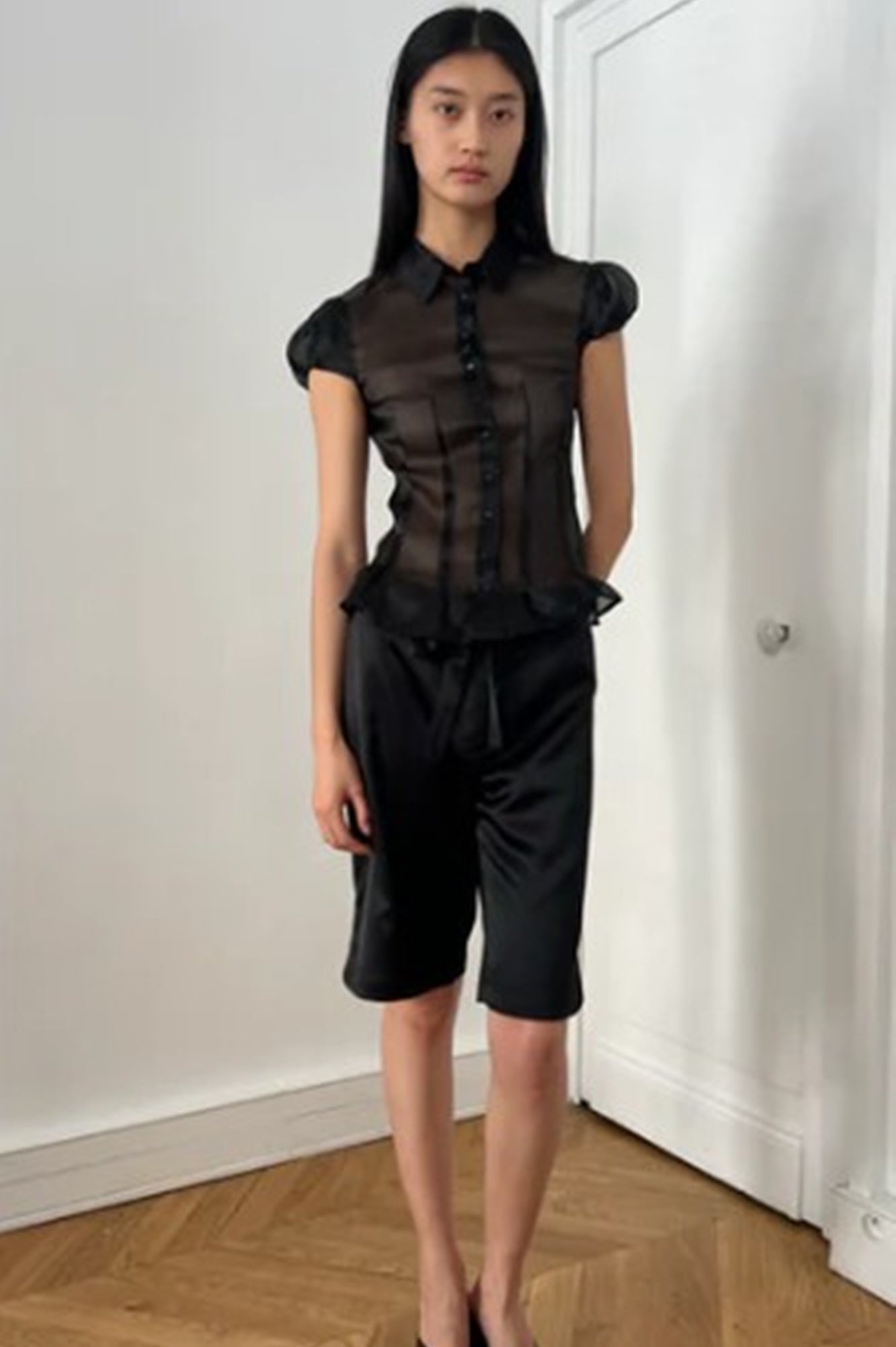 image of a model wearing the Alfie Abby shirt in black