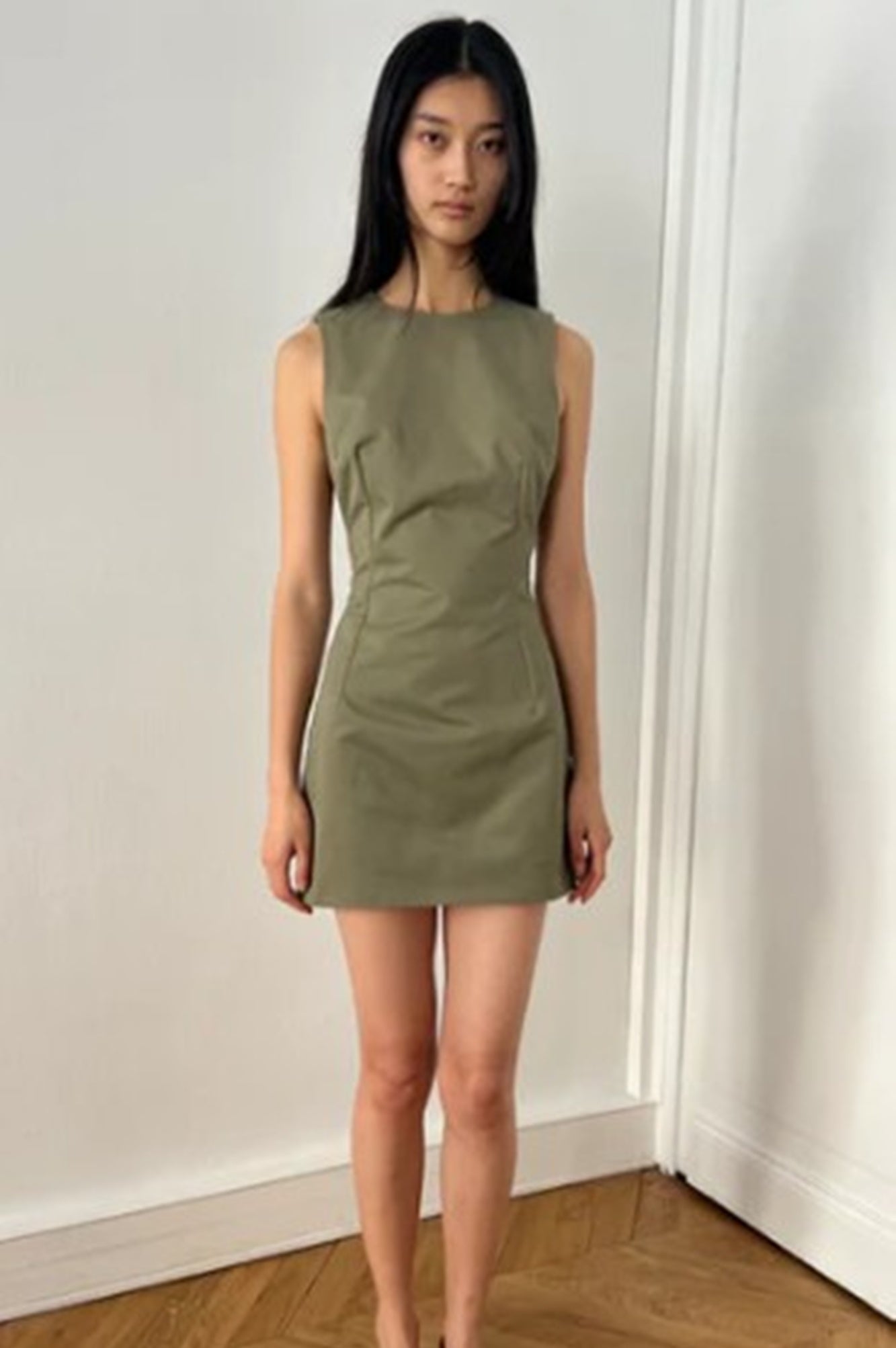 image of a model wearing the Alfie Mini Nori dress in khaki