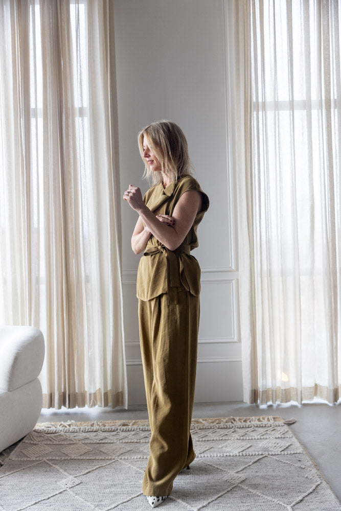 image of a woman wearing the Alysi Blouse with Sash and Wide Leg Pull on Trousers