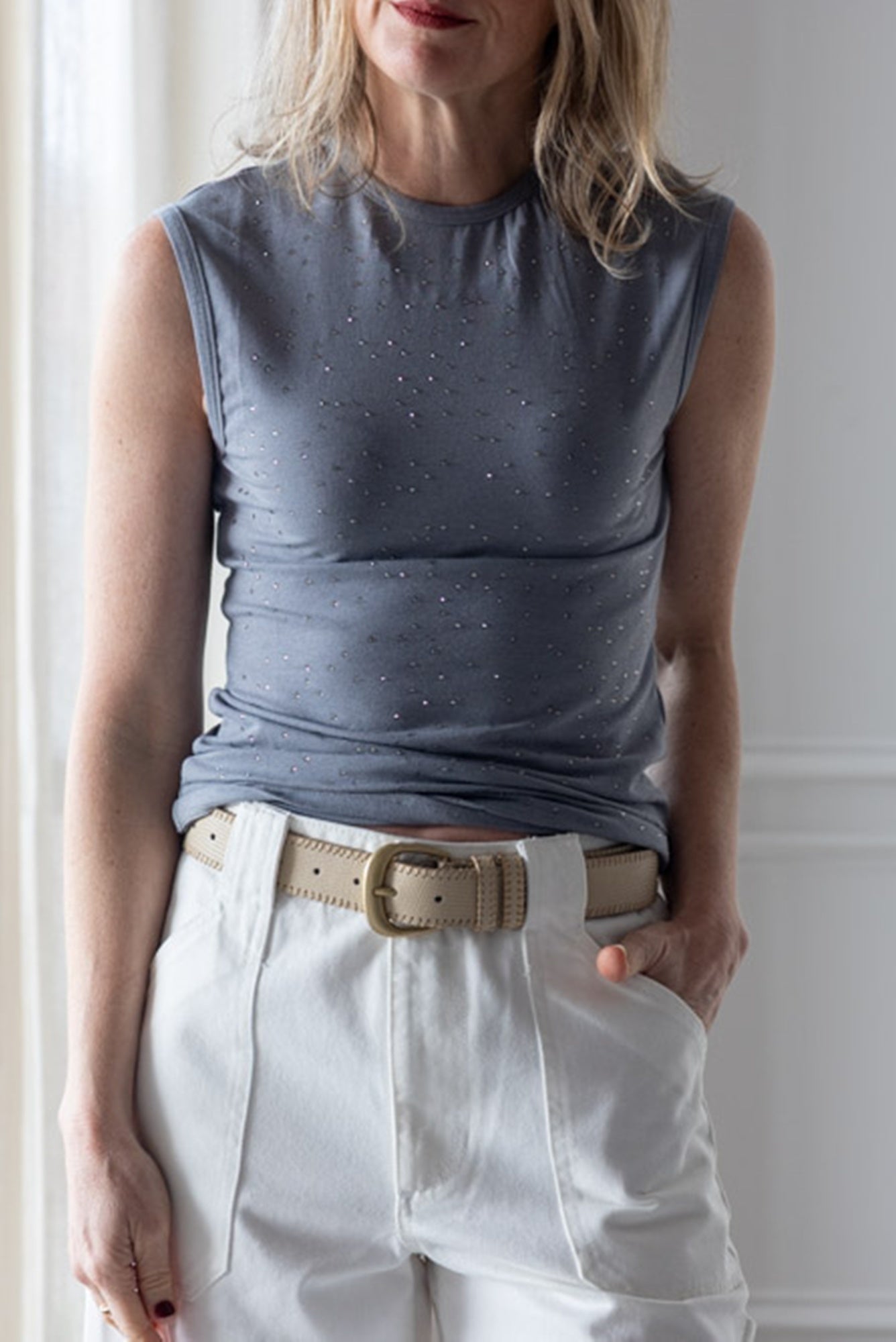 image of a woman wearing the Alysi Jersey Top with Rhinestones