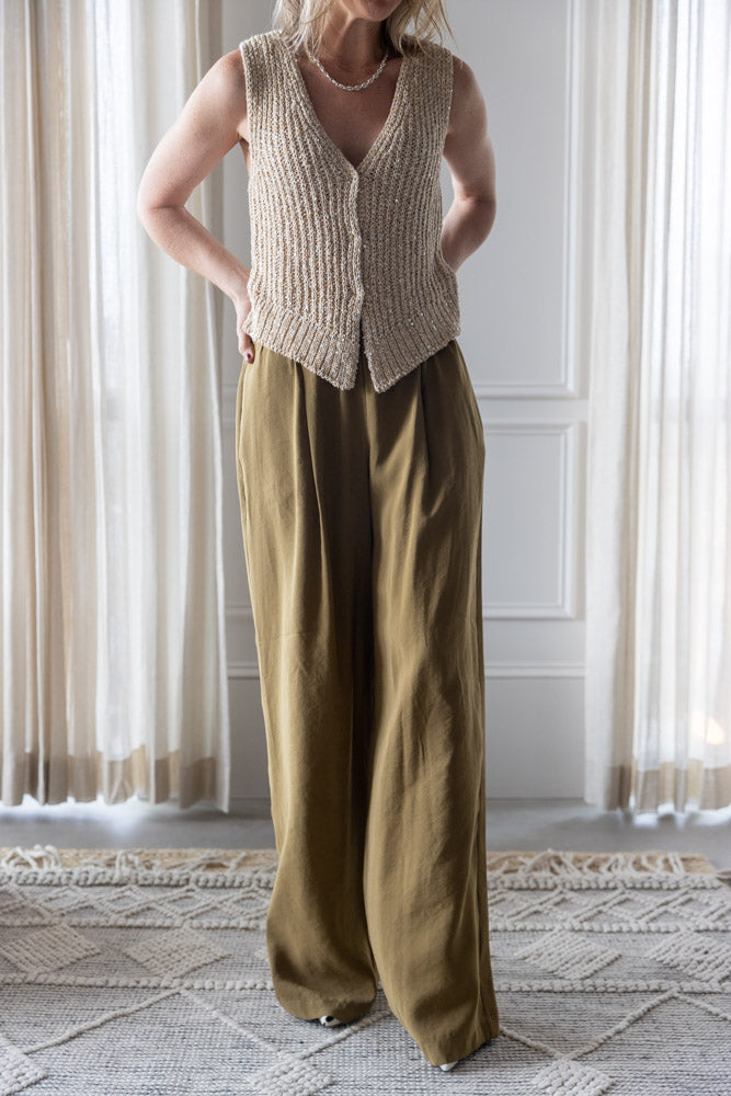 image of a woman wearing the Alysi Sequin Vest and Wide Leg Pants