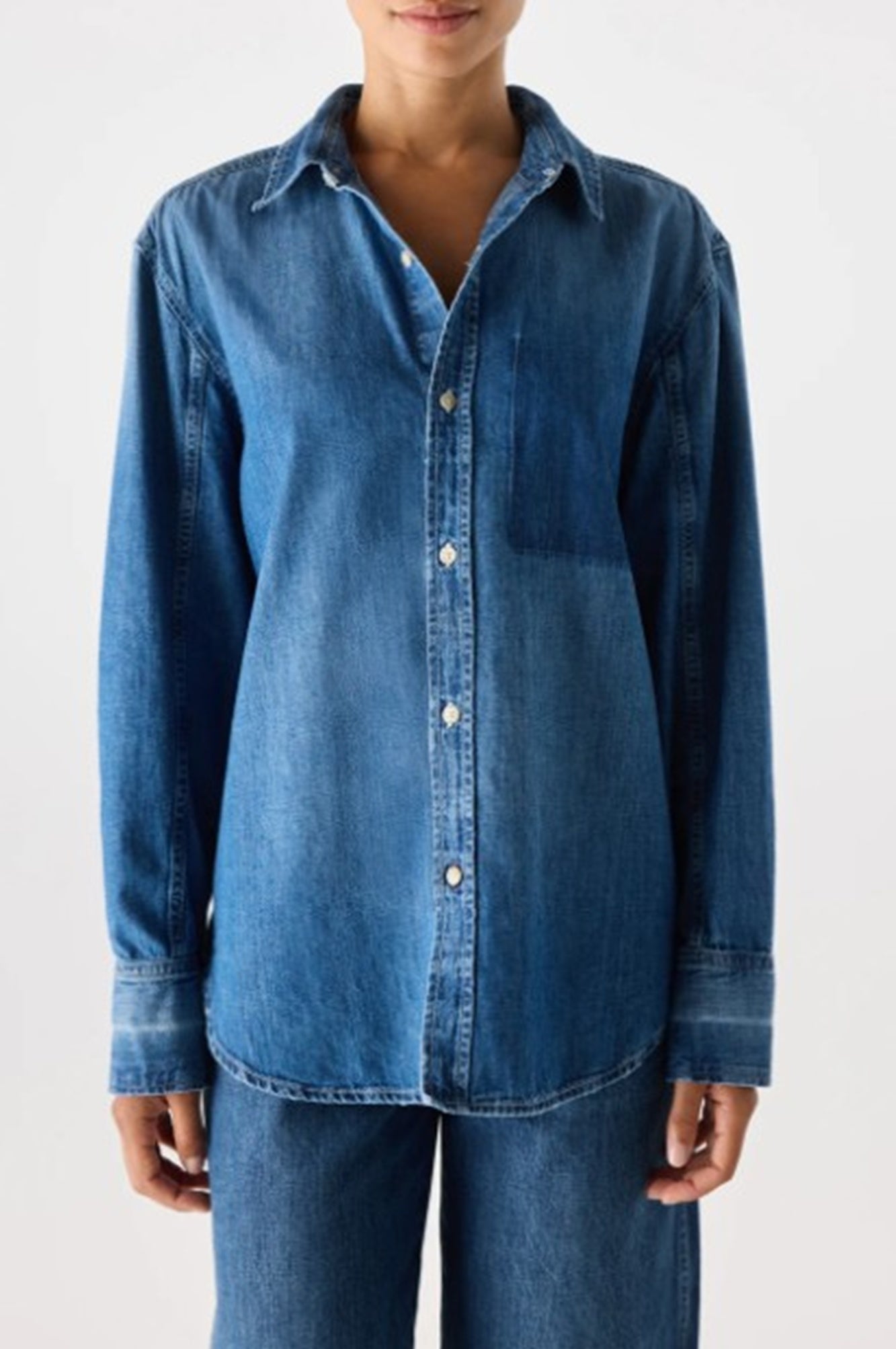 image of a woman wearing the Amo Ruth Denim Shirt