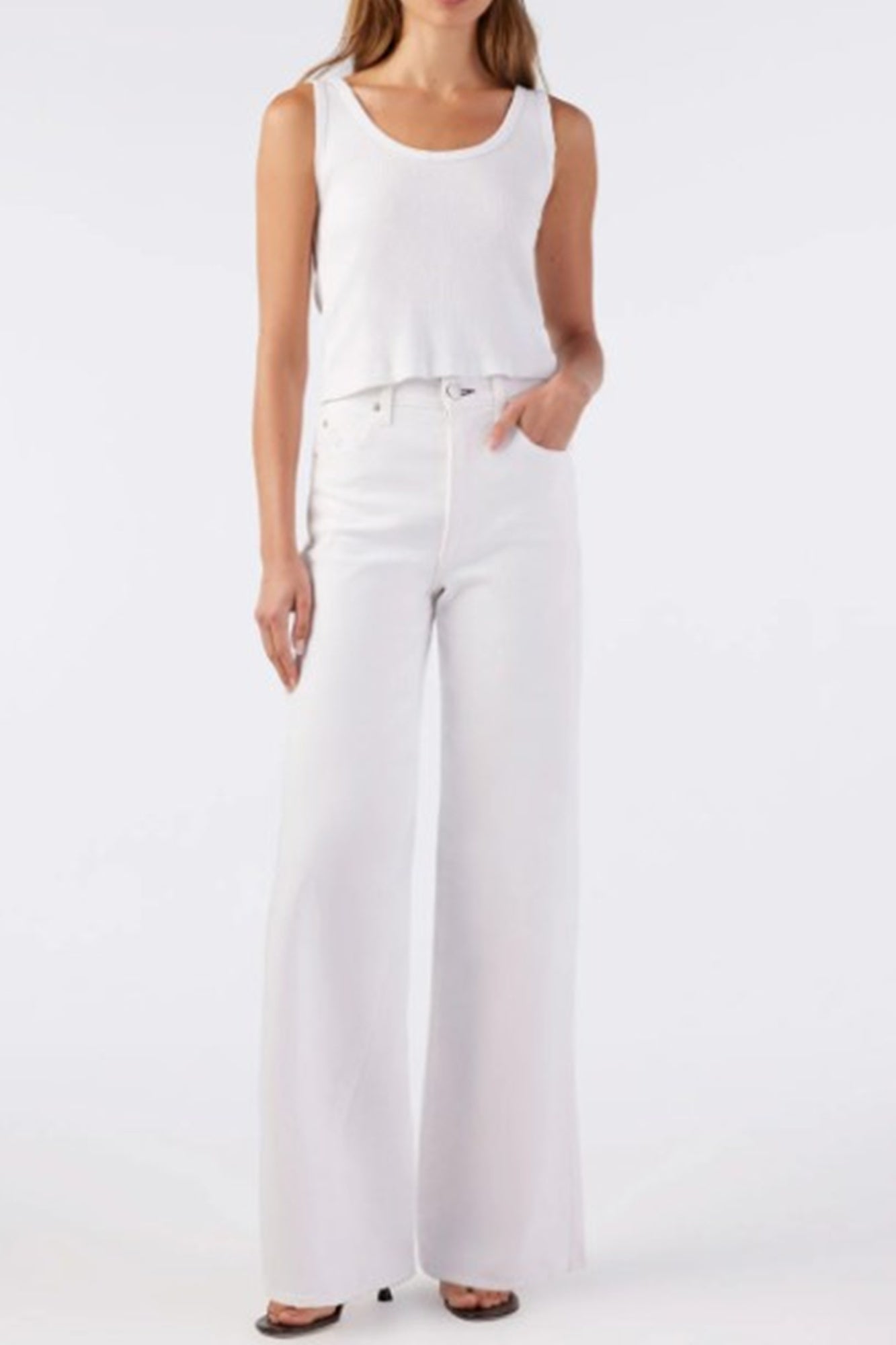 image of a model wearing the Amo Frida Jeans in Alabaster
