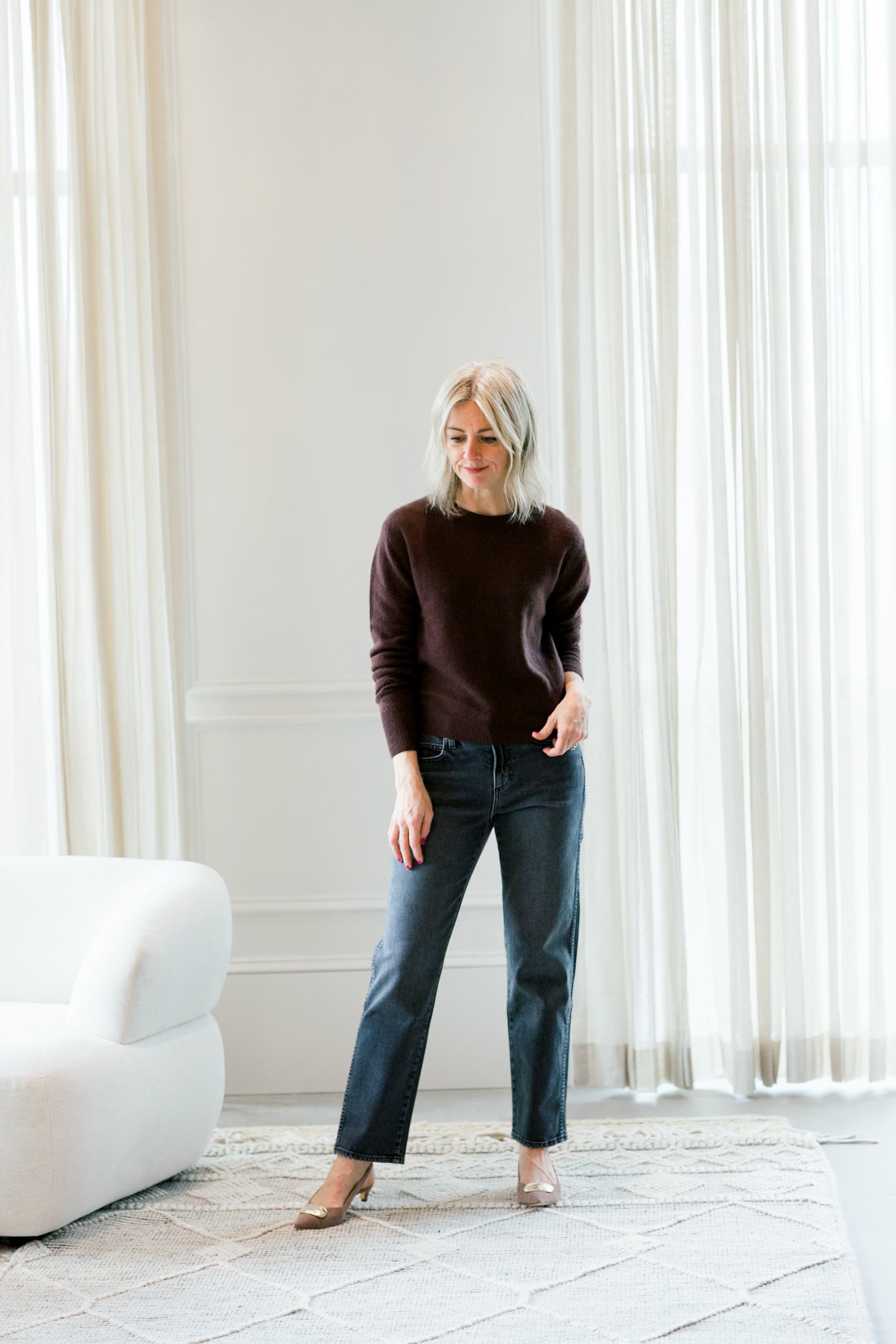 image of a woman wearing the amo libby jeans