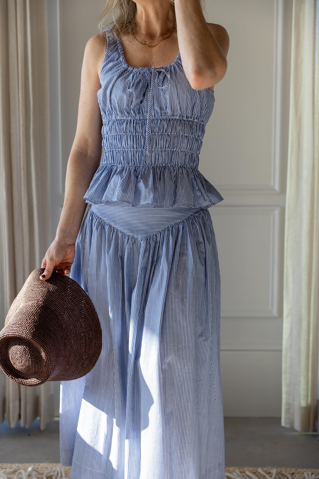 image of a woman wearing the Ciao Lucia Gigi Top and Zoe Skirt