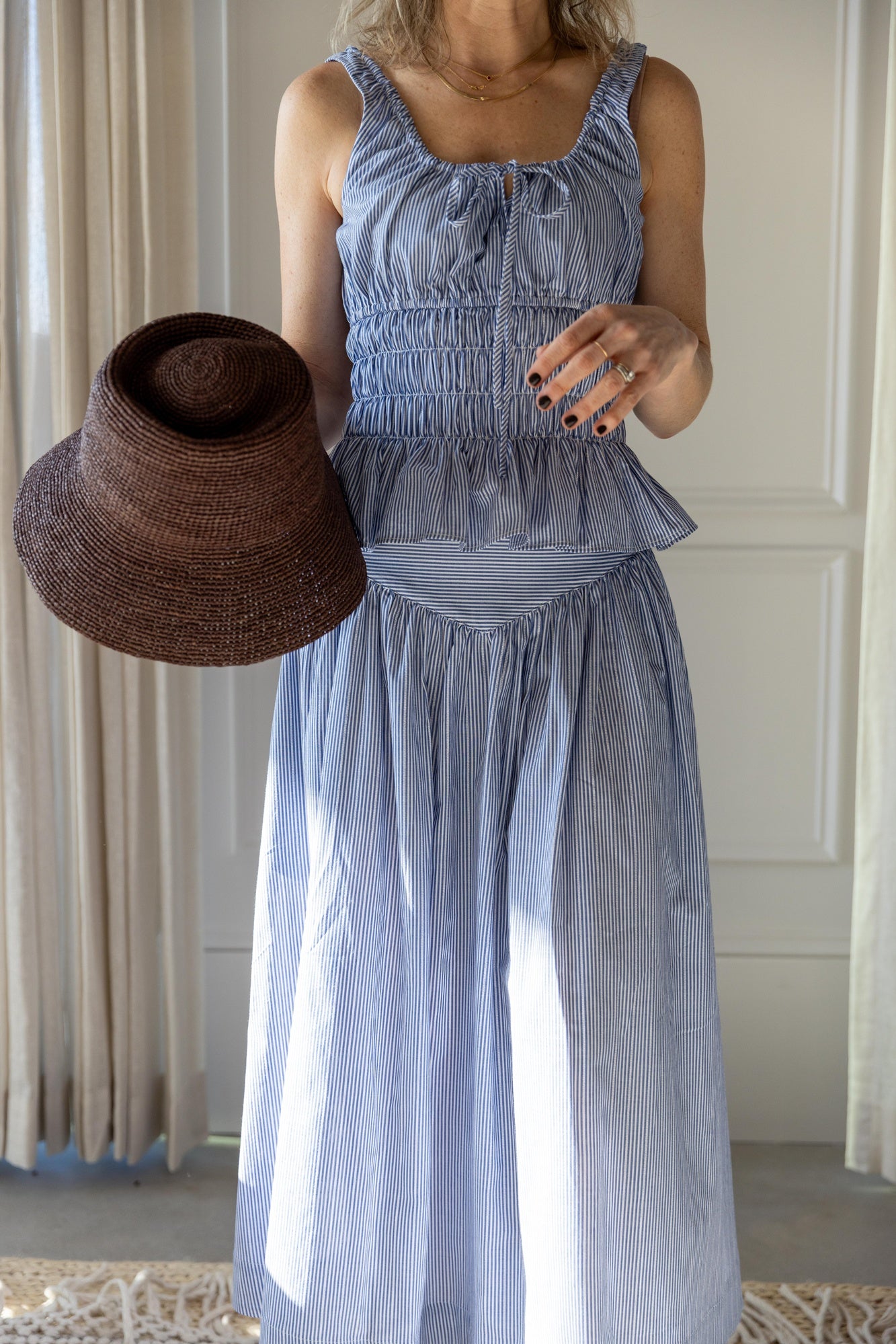 image of a woman wearing the Ciao Lucia Gigi Top and Zoe Skirt