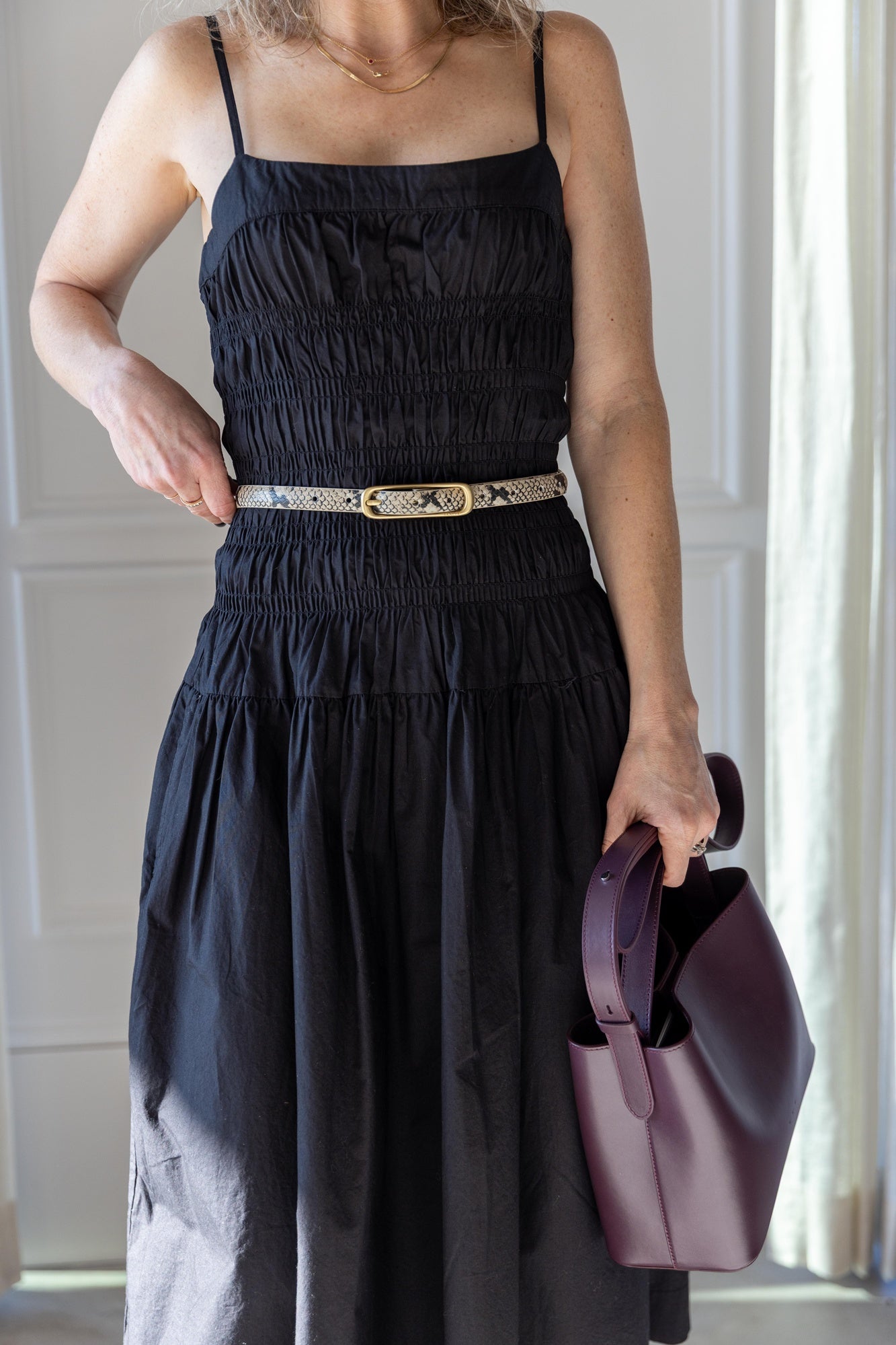 image of a woman wearing the Ciao Lucia Rosella Dress