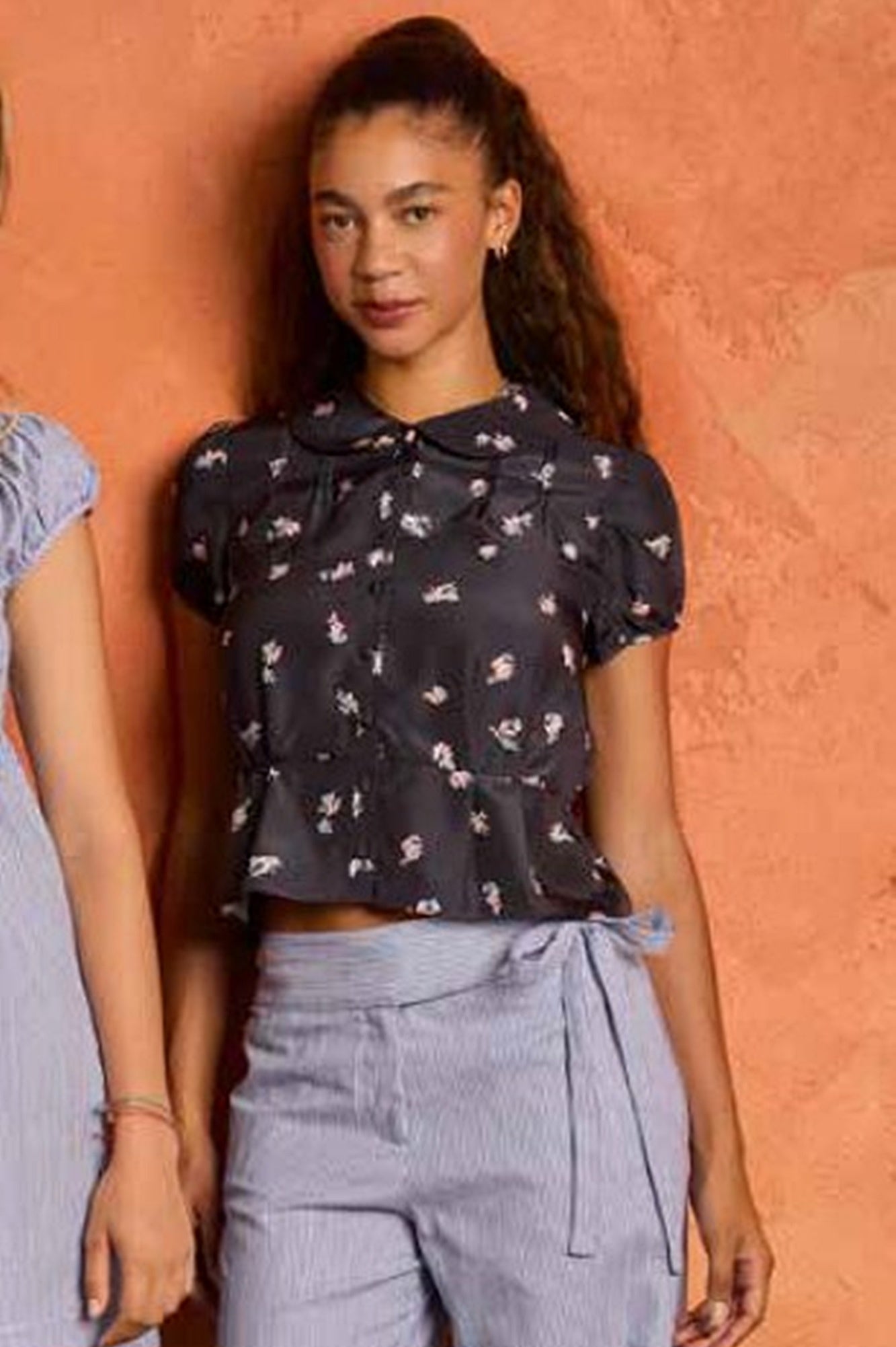 image of a model wearing the Ciao Lucia Yvonne Top