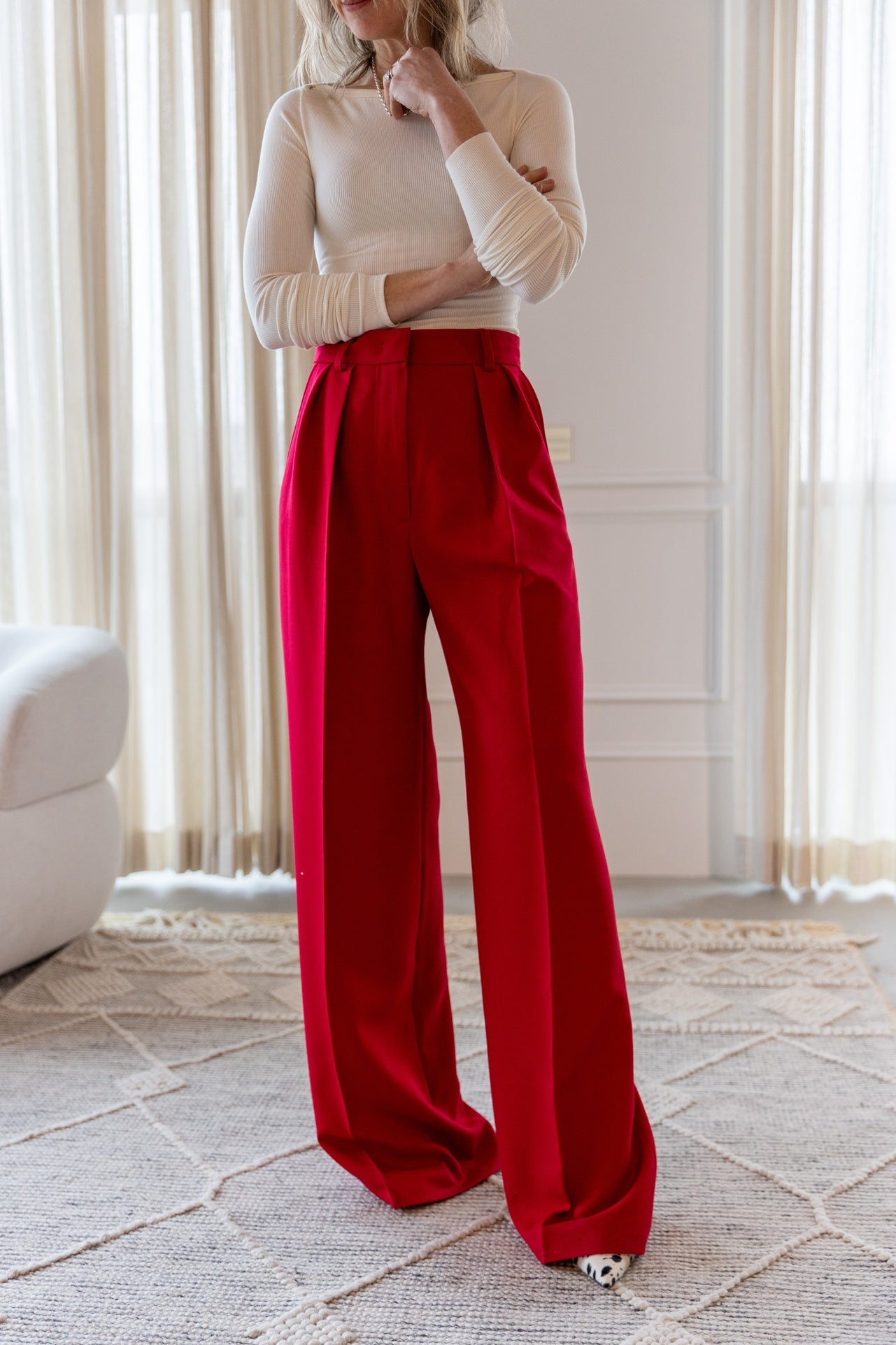 image of a woman wearing the Eterne Boatneck Tee and Rhune Celine Pants