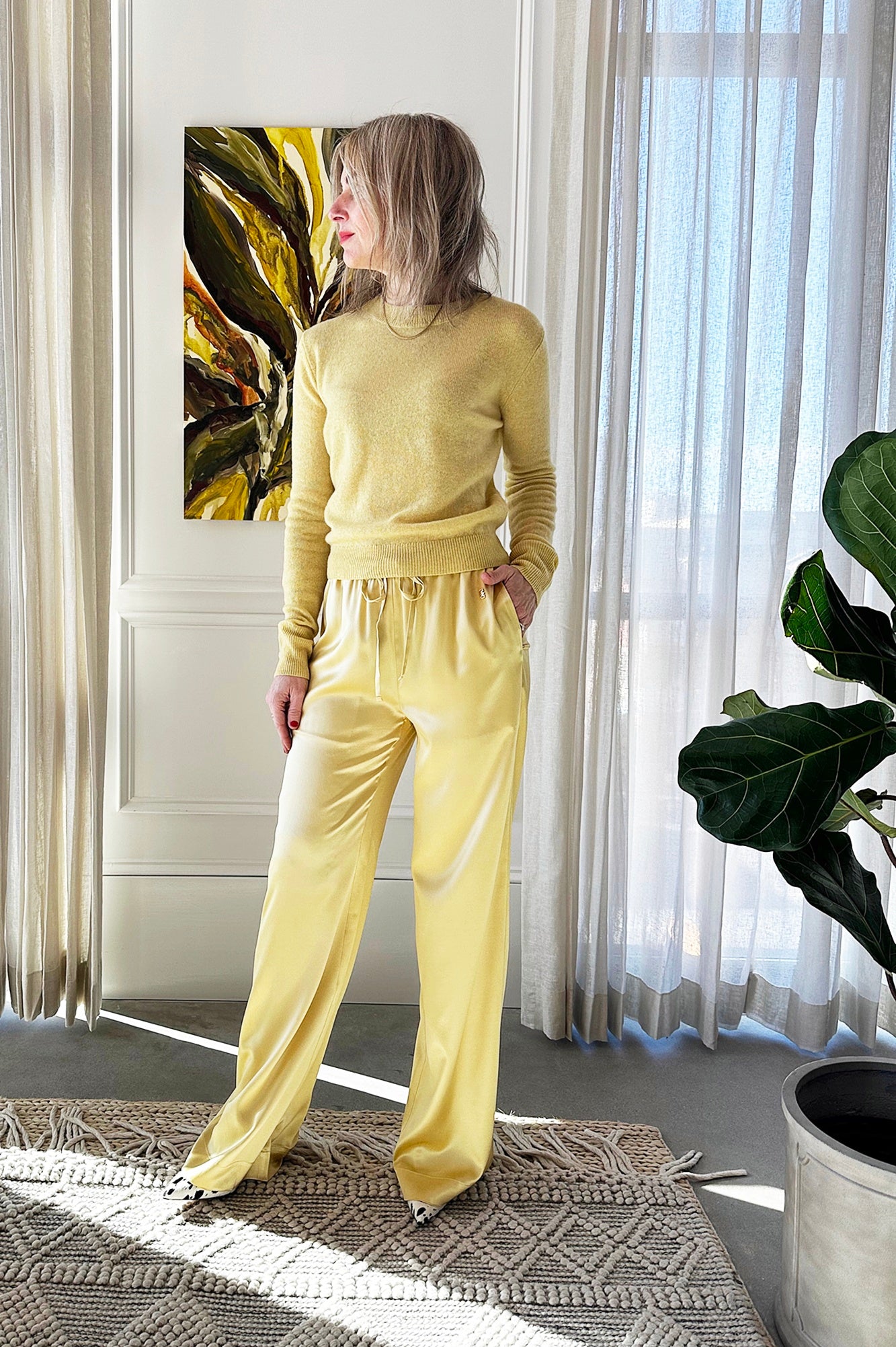 image of a woman wearing the Eterne Francis Sweater and Brody Pants