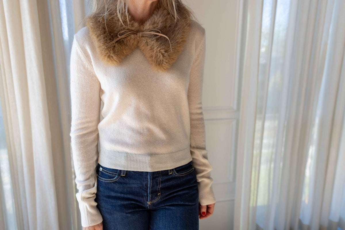 by Malene Birger Cowie Faux Fur Scarf in Tannin with the Eterne Francis Sweater in Cream and dark jeans, front view