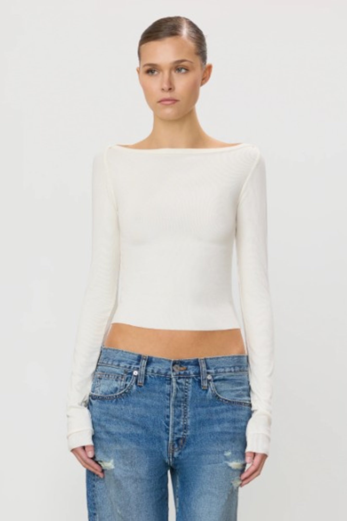 image of a model wearing the Eterne Long Sleeve Boatneck Top in Cream