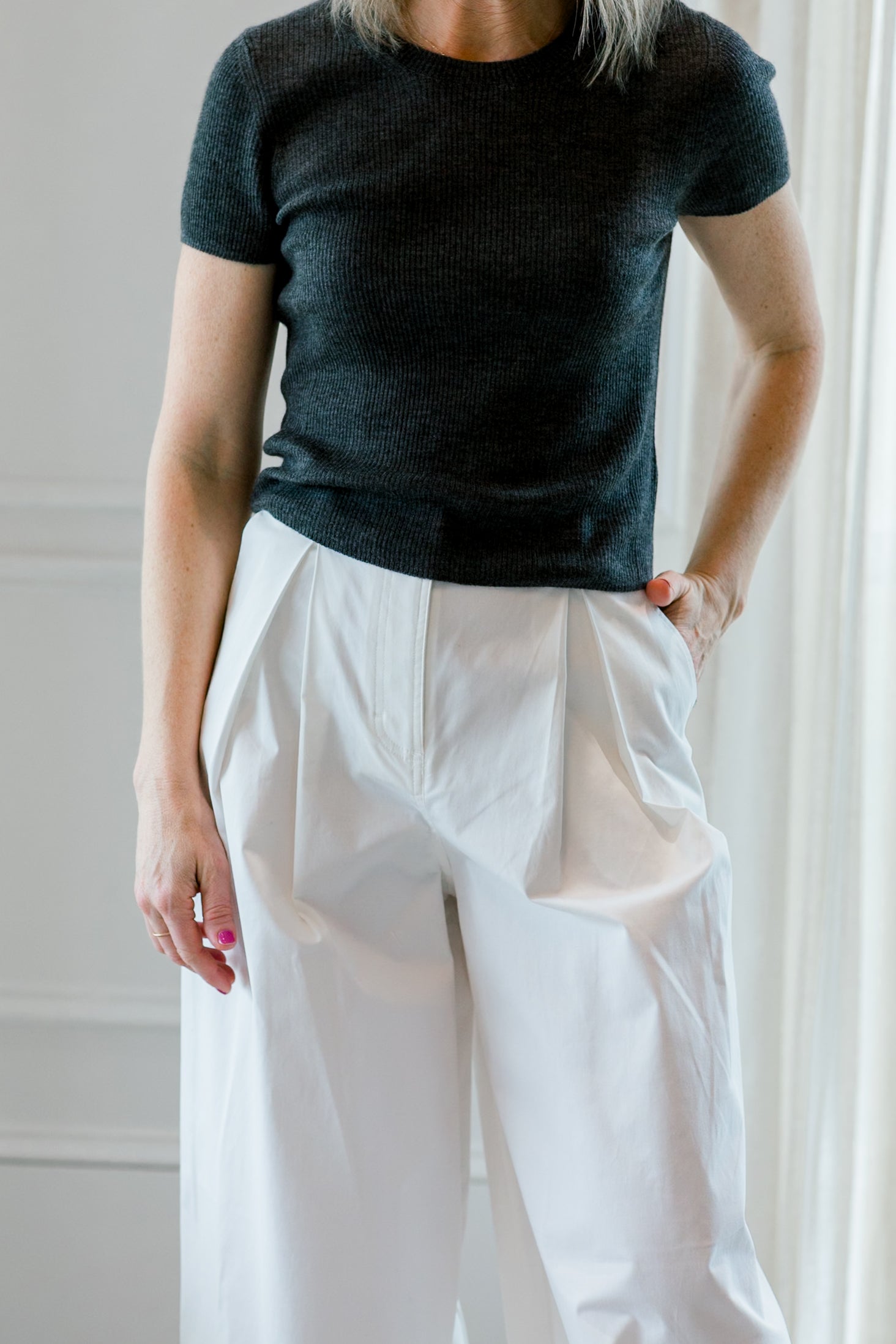 image of a woman wearing the eterne rib stitch baby tee