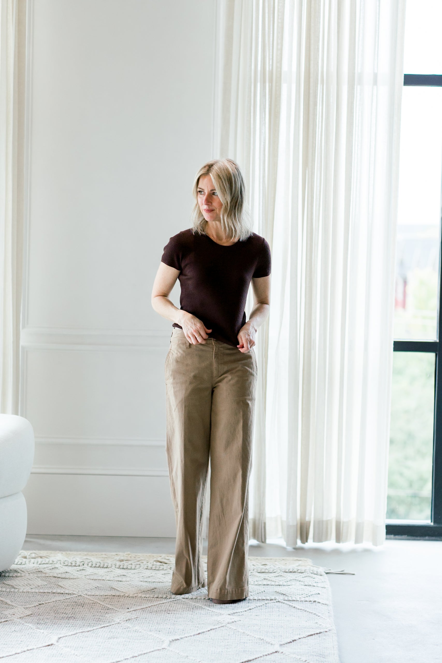 image of a woman wearing the eterne rib stitch tee in espresso and amo maddi trousers