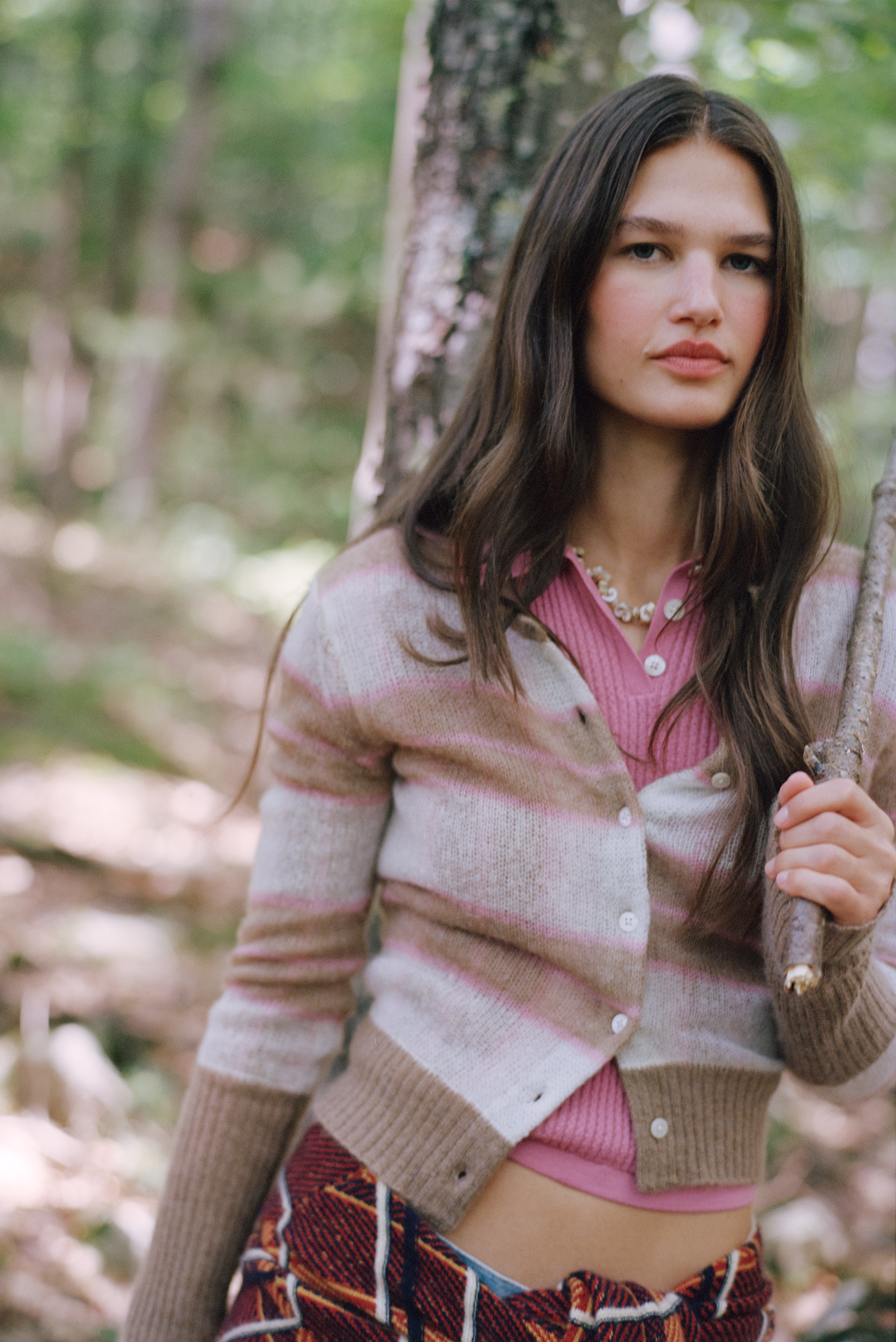 model wearing the guest in residence shadow plaid cardigan