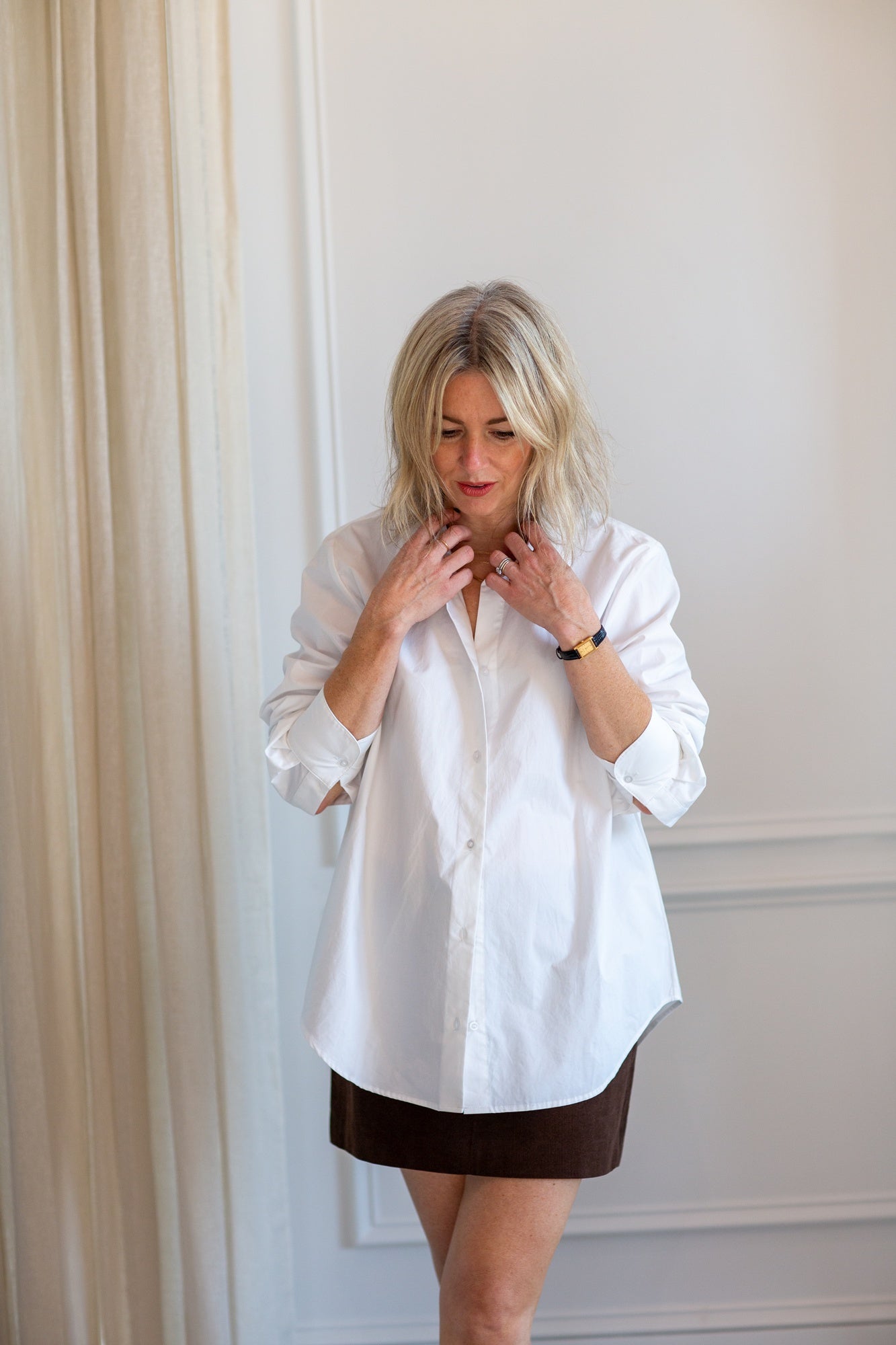 model wearing the herskind joe shirt and seroya azalea mini skirt