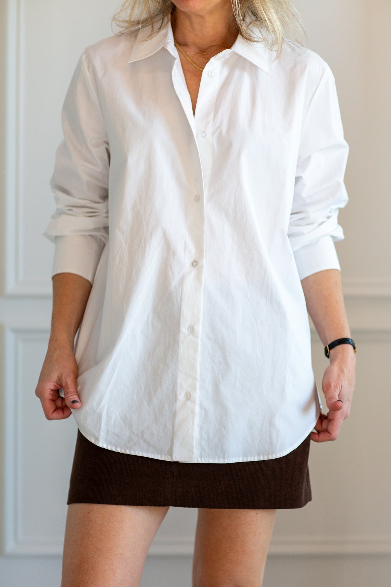 model wearing the herskind joe shirt and seroya azalea mini skirt