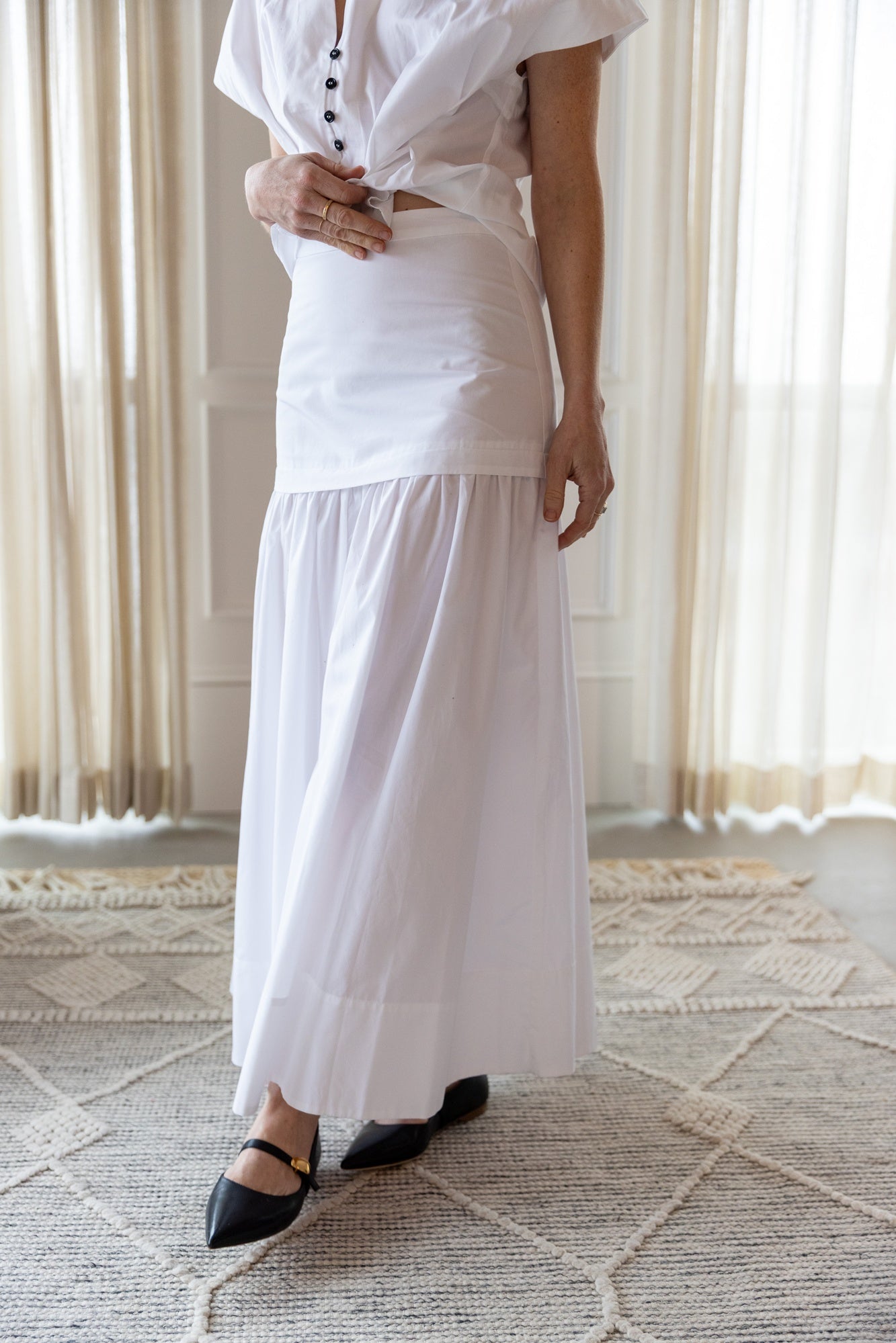 image of a woman wearing the House of Dagmar Cotton Maxi Skirt