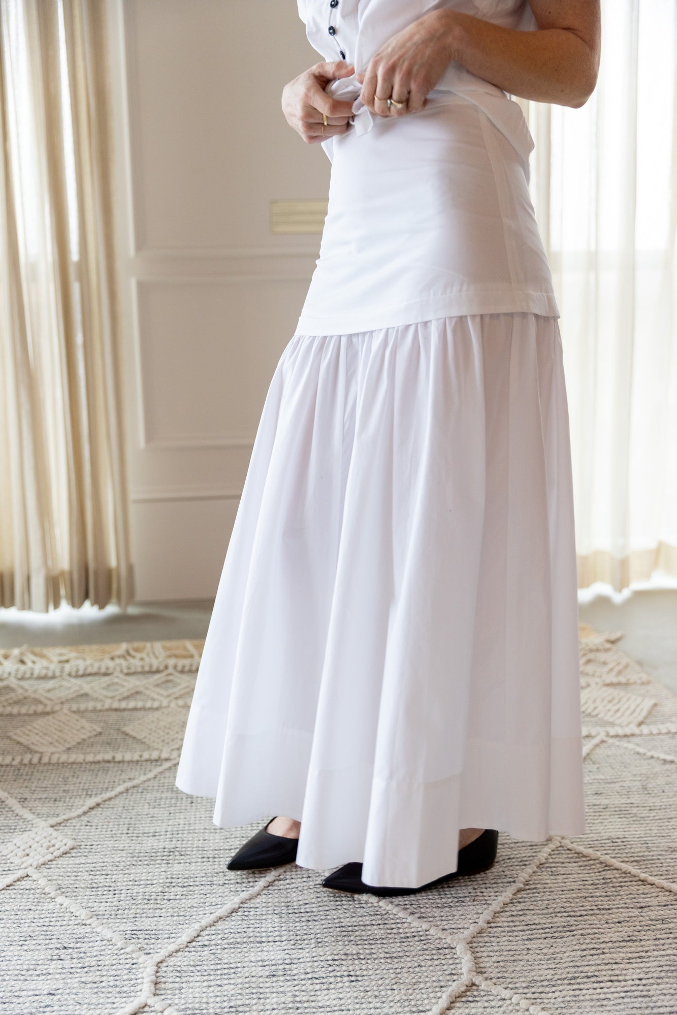 image of a woman wearing the House of Dagmar Cotton Maxi Skirt