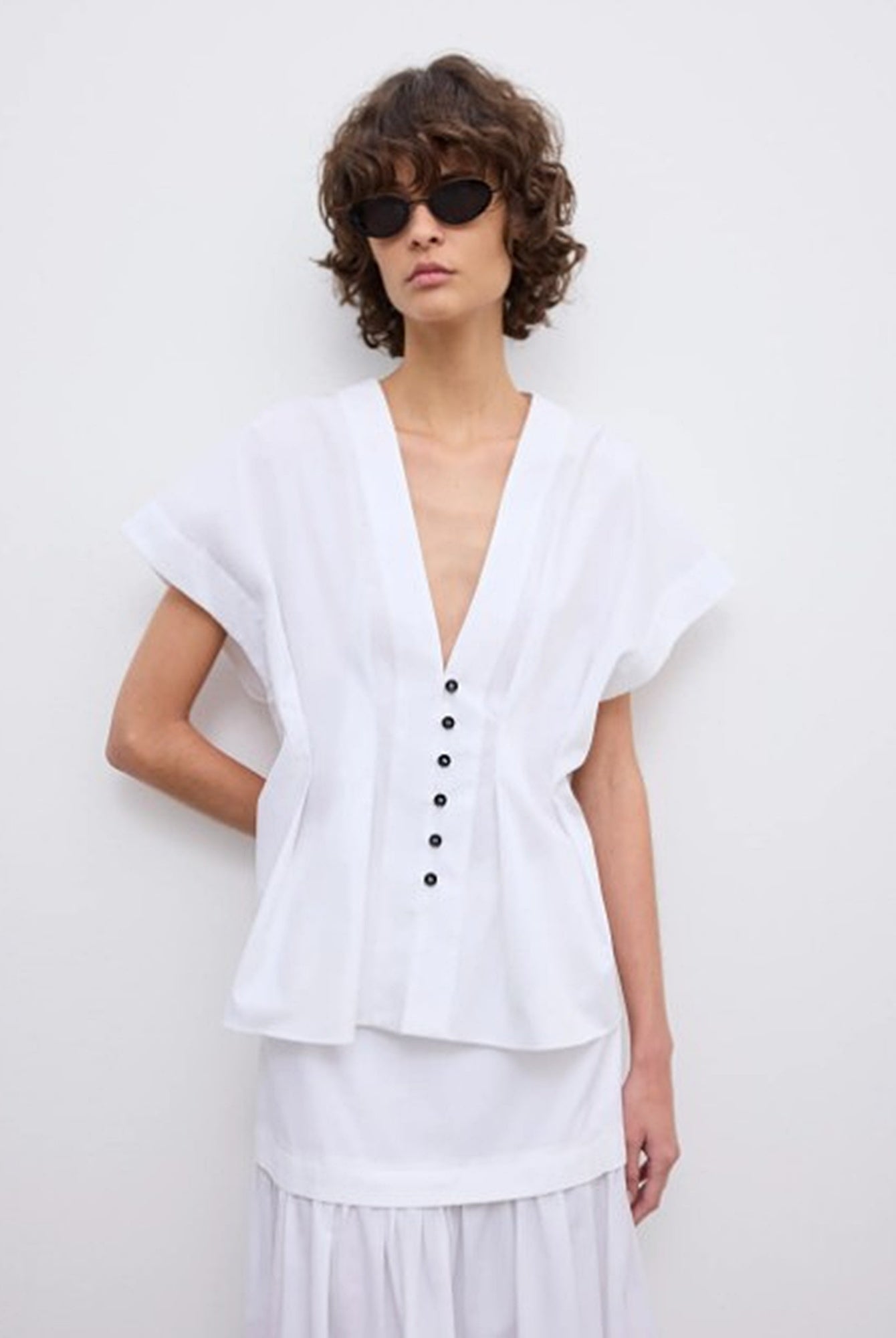 image of a woman wearing the House of Dagmar Cinched Cotton Top and Maxi Skirt