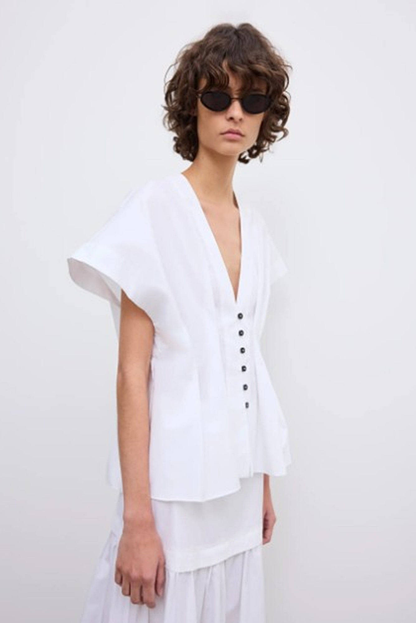 image of a woman wearing the House of Dagmar Cinched Cotton Top and Maxi Skirt