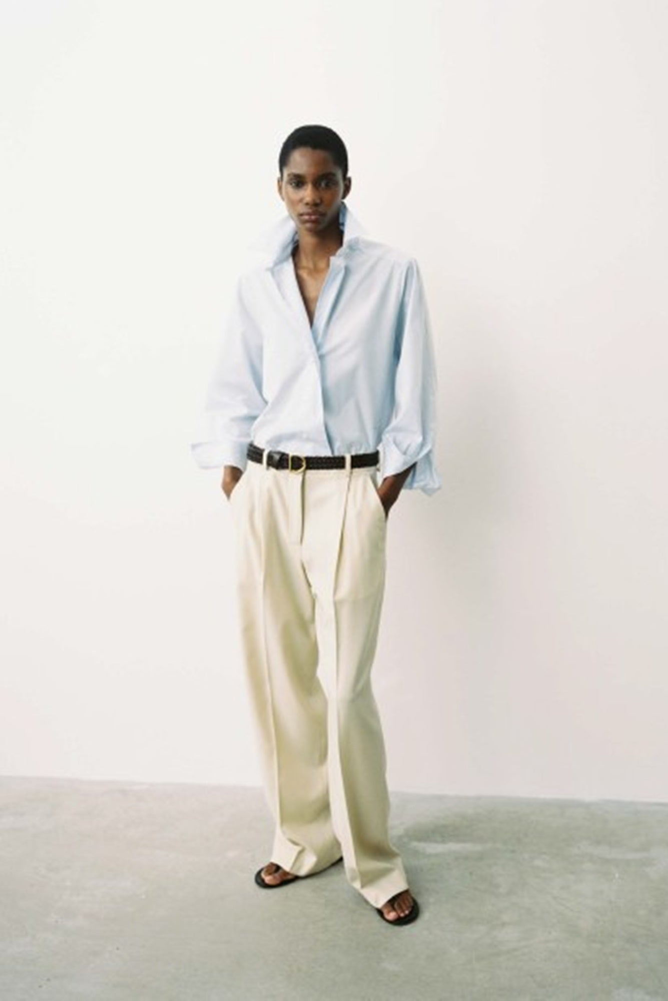 image of a model wearing the House of Dagmar Cropped Shirt in light blue