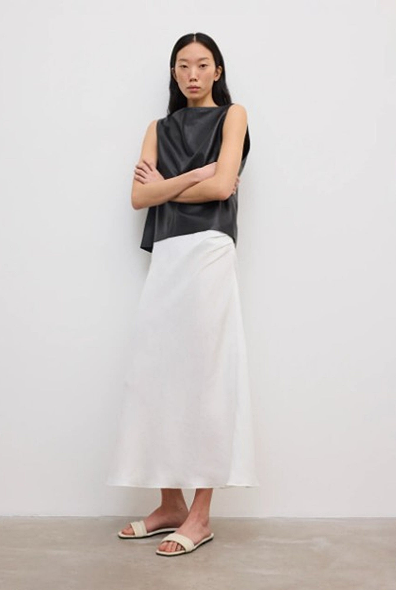 image of a model wearing the House of Dagmar Draped Midi Skirt