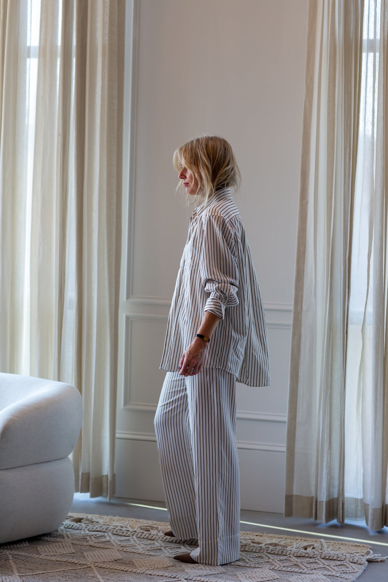 model wearing the house of dagmar fluid stripe relaxed trousers