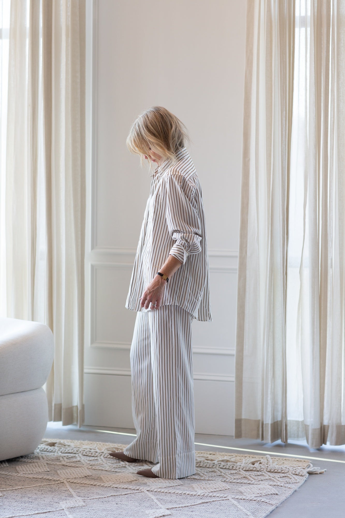 model wearing the house of dagmar fluid stripe relaxed trousers